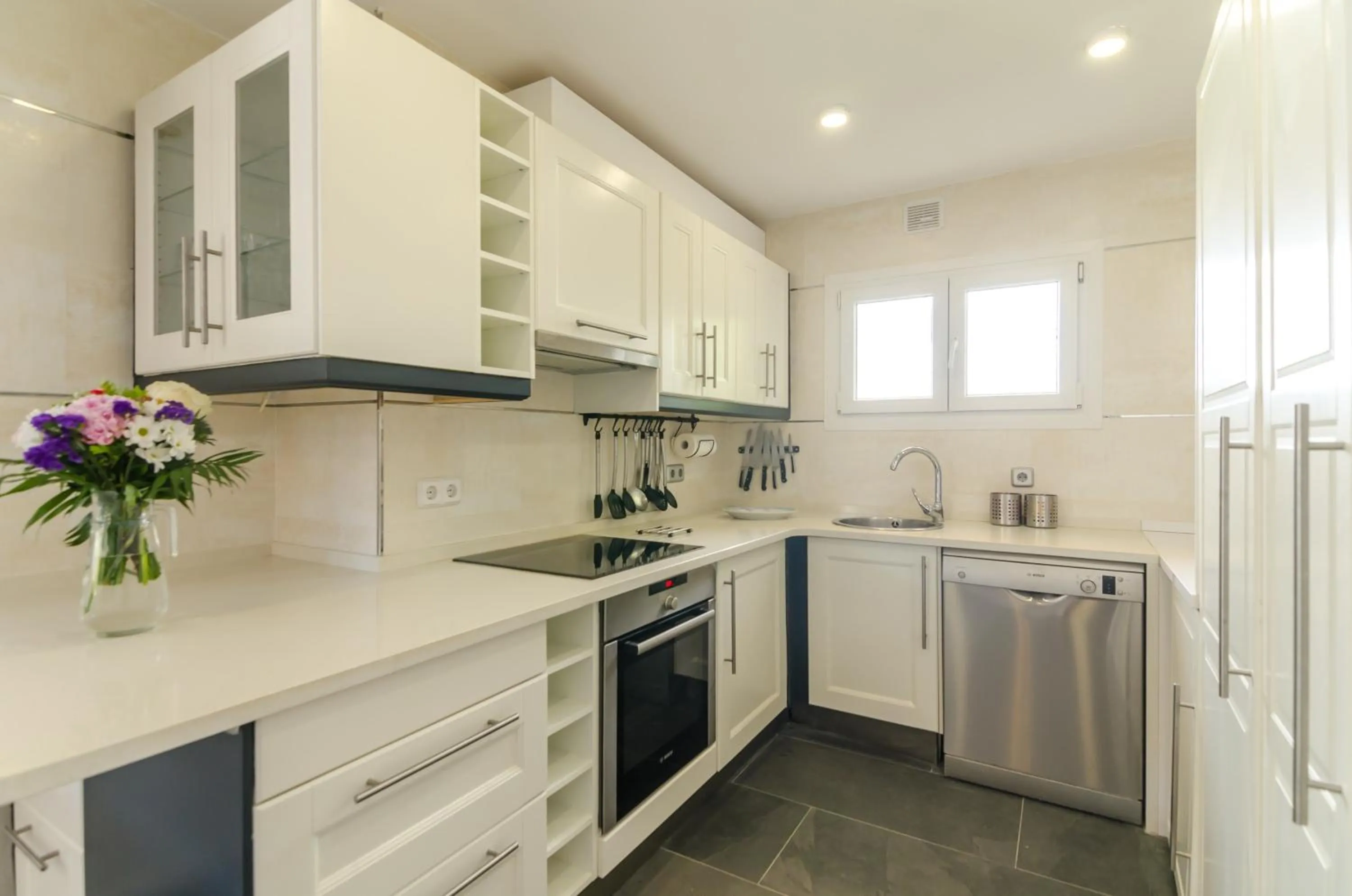 Kitchen or kitchenette in Seaside villa in Lloret de Mar with garden and pool view