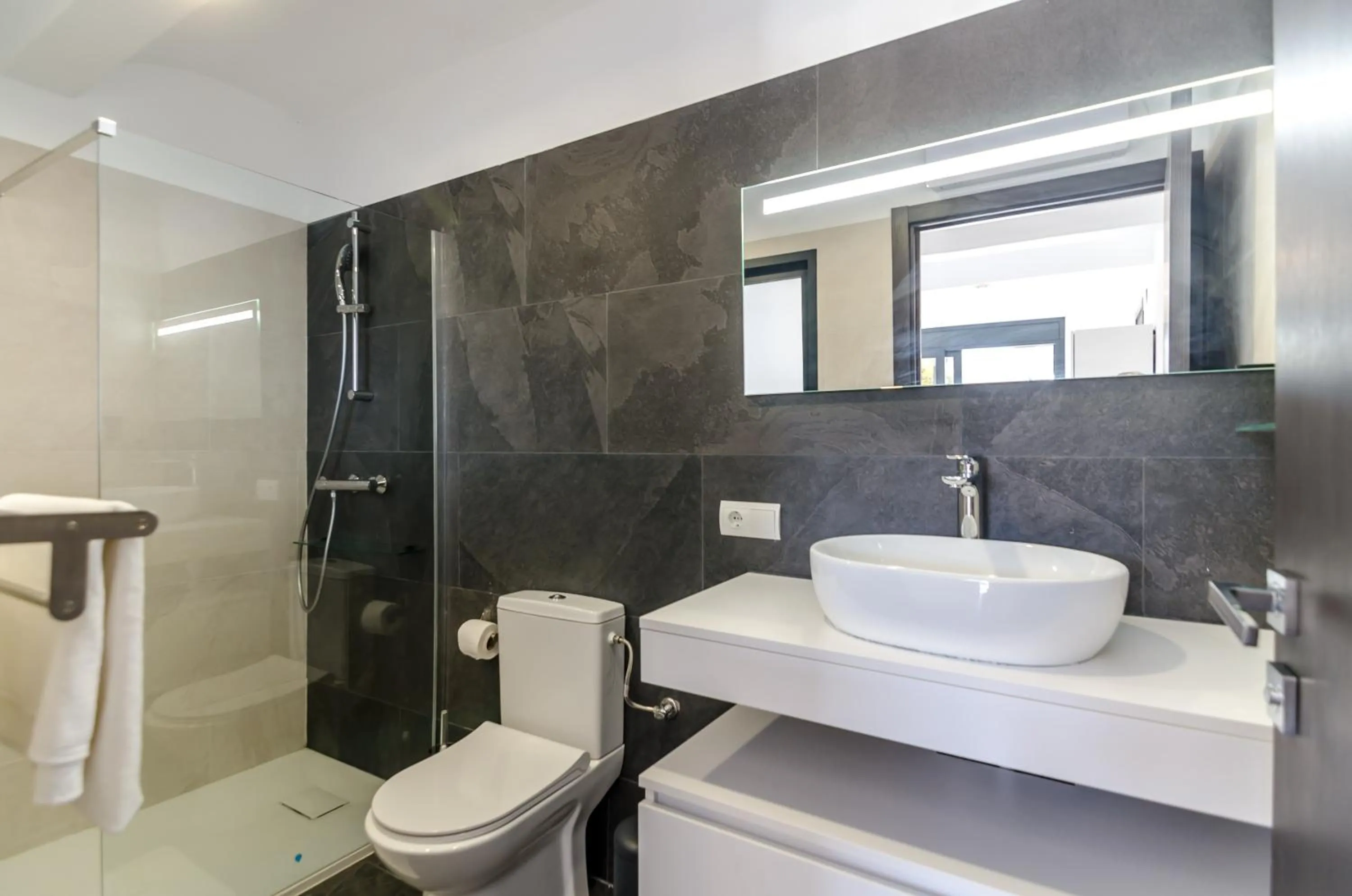 Bathroom in Seaside villa in Lloret de Mar with garden and pool view