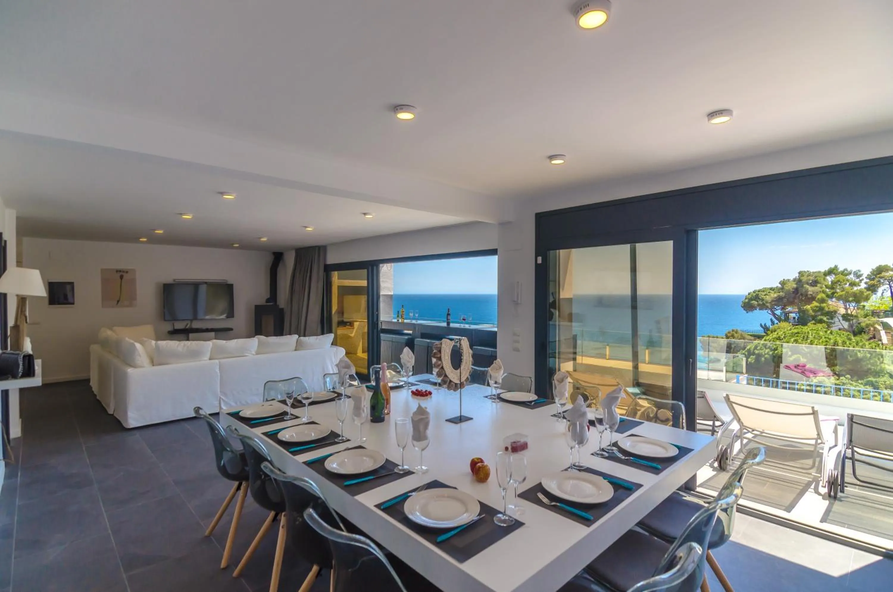 Living room in Seaside villa in Lloret de Mar with garden and pool view