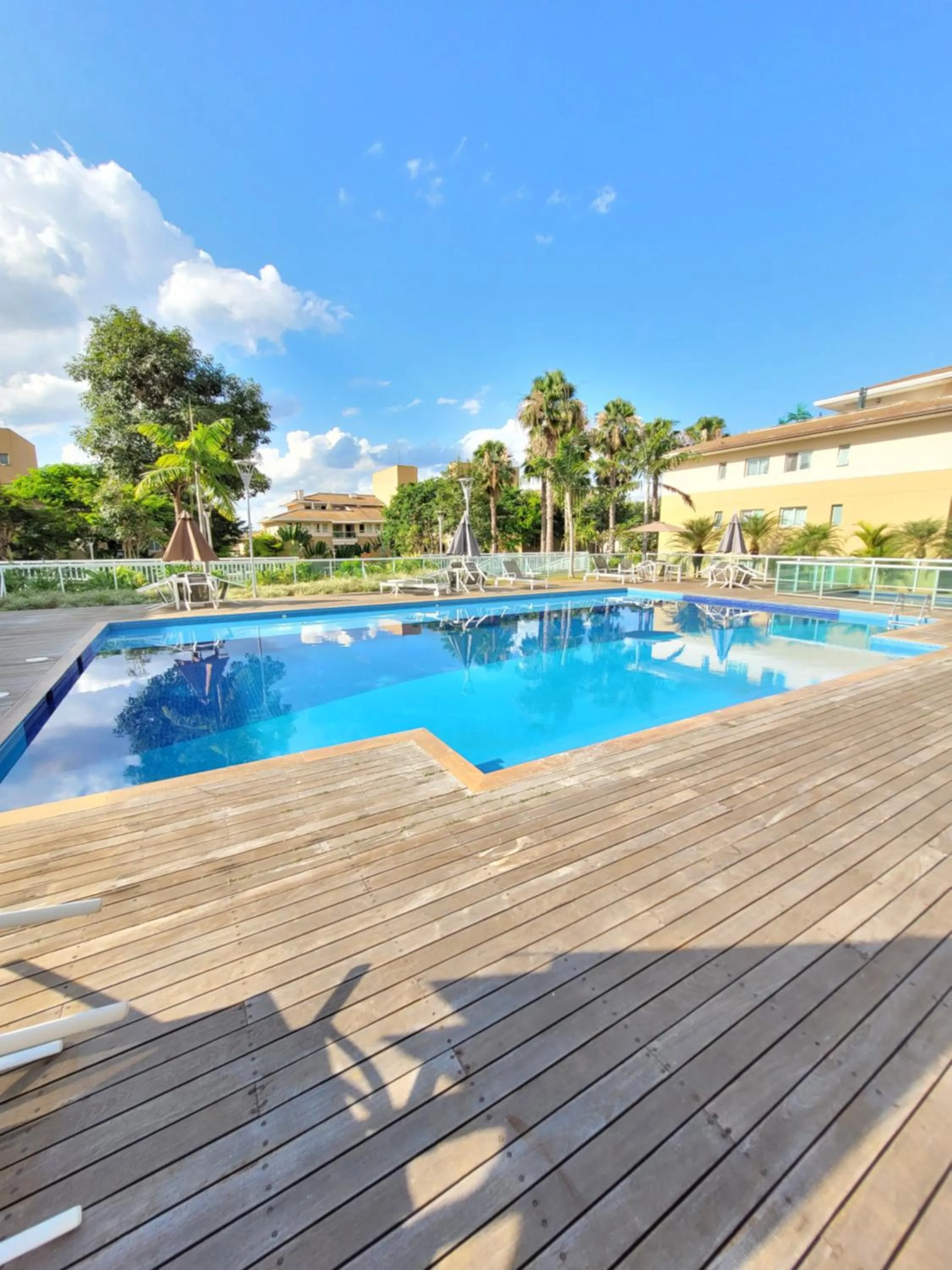 Swimming pool in The Sun Resort By Rei dos Flats