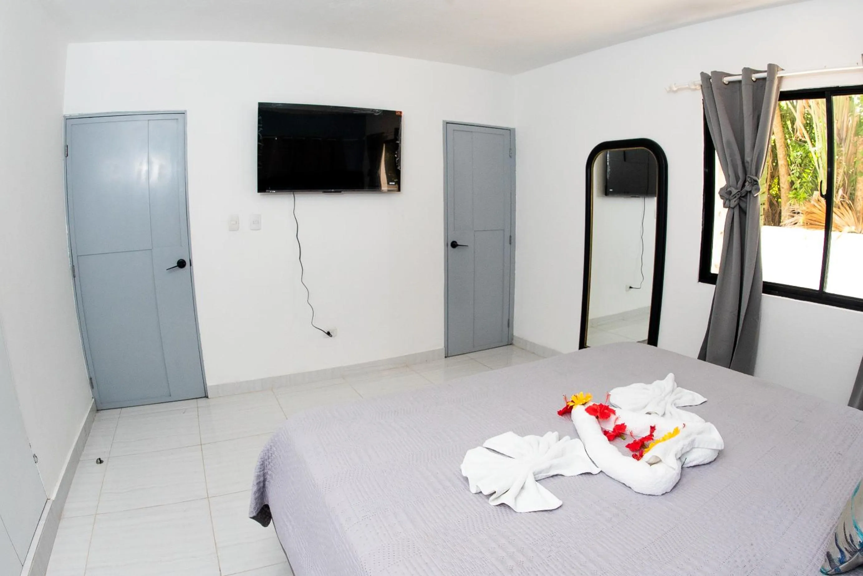 Bed in Skylight Suites Hotel