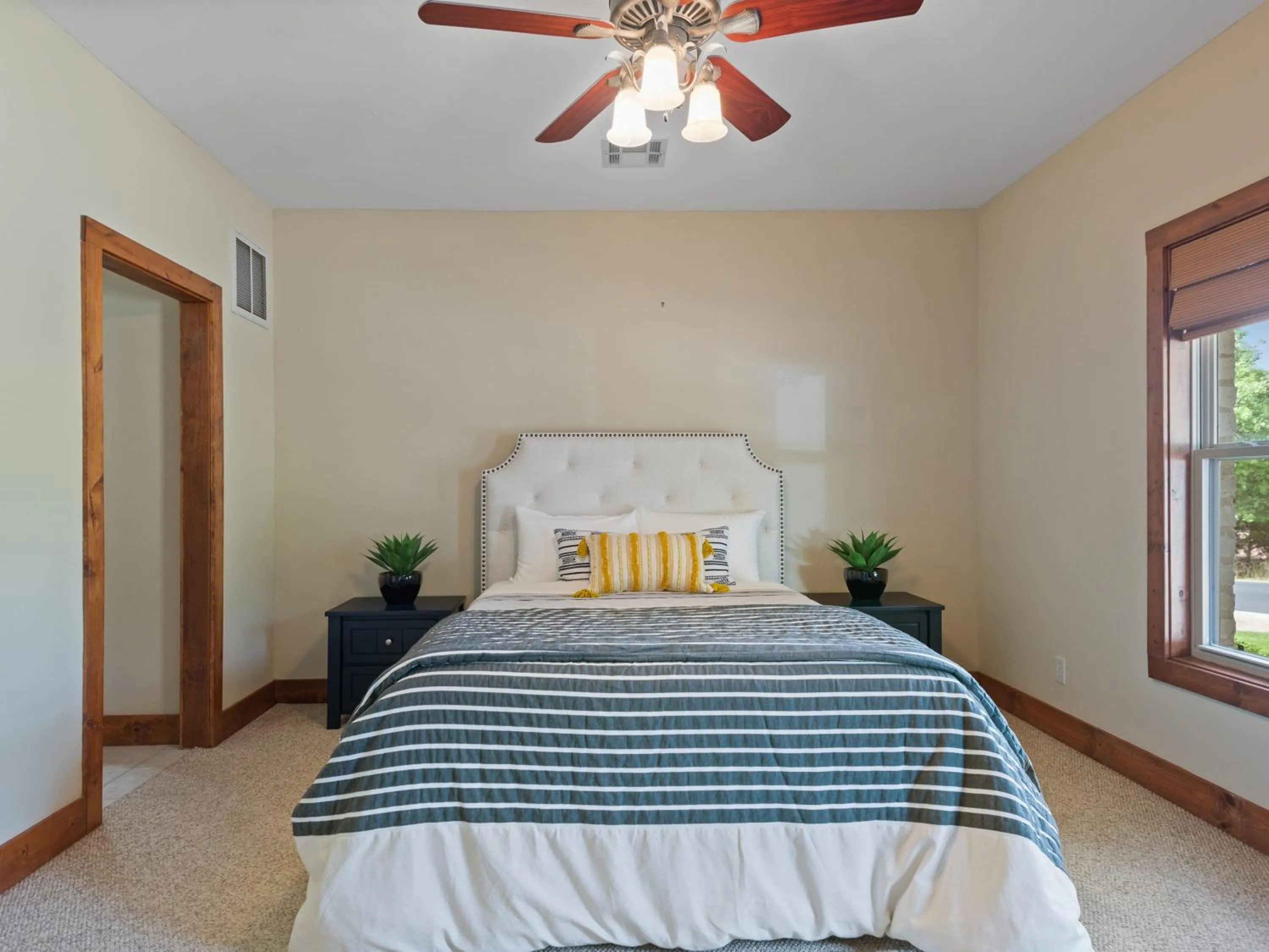 Bed in Waterfront Home with Boat Slip, Spacious Outdoor Patio and a Fenced Yard