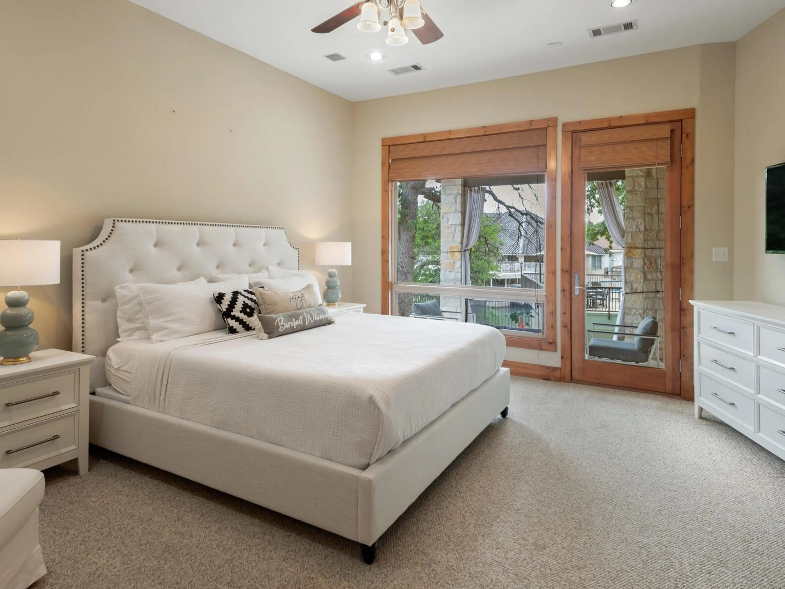 Bed in Waterfront Home with Boat Slip, Spacious Outdoor Patio and a Fenced Yard