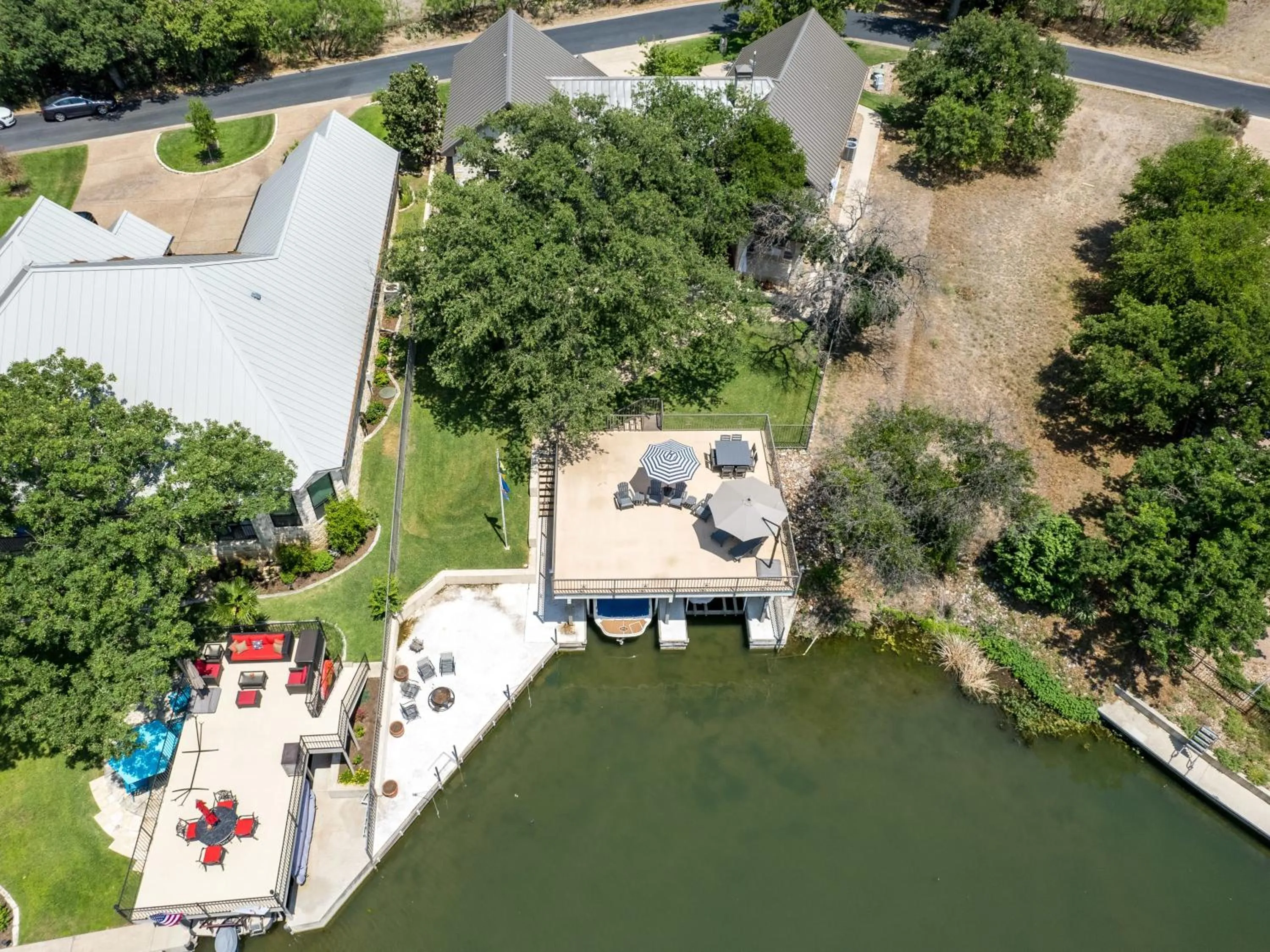 Waterfront Home with Boat Slip, Spacious Outdoor Patio and a Fenced Yard