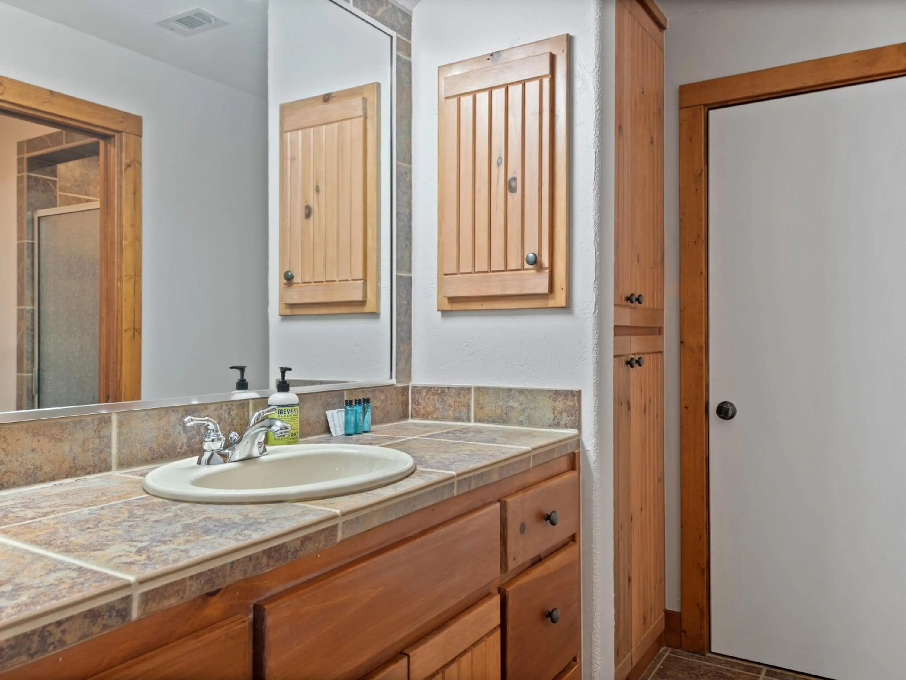 Waterfront Home with Boat Slip, Spacious Outdoor Patio and a Fenced Yard