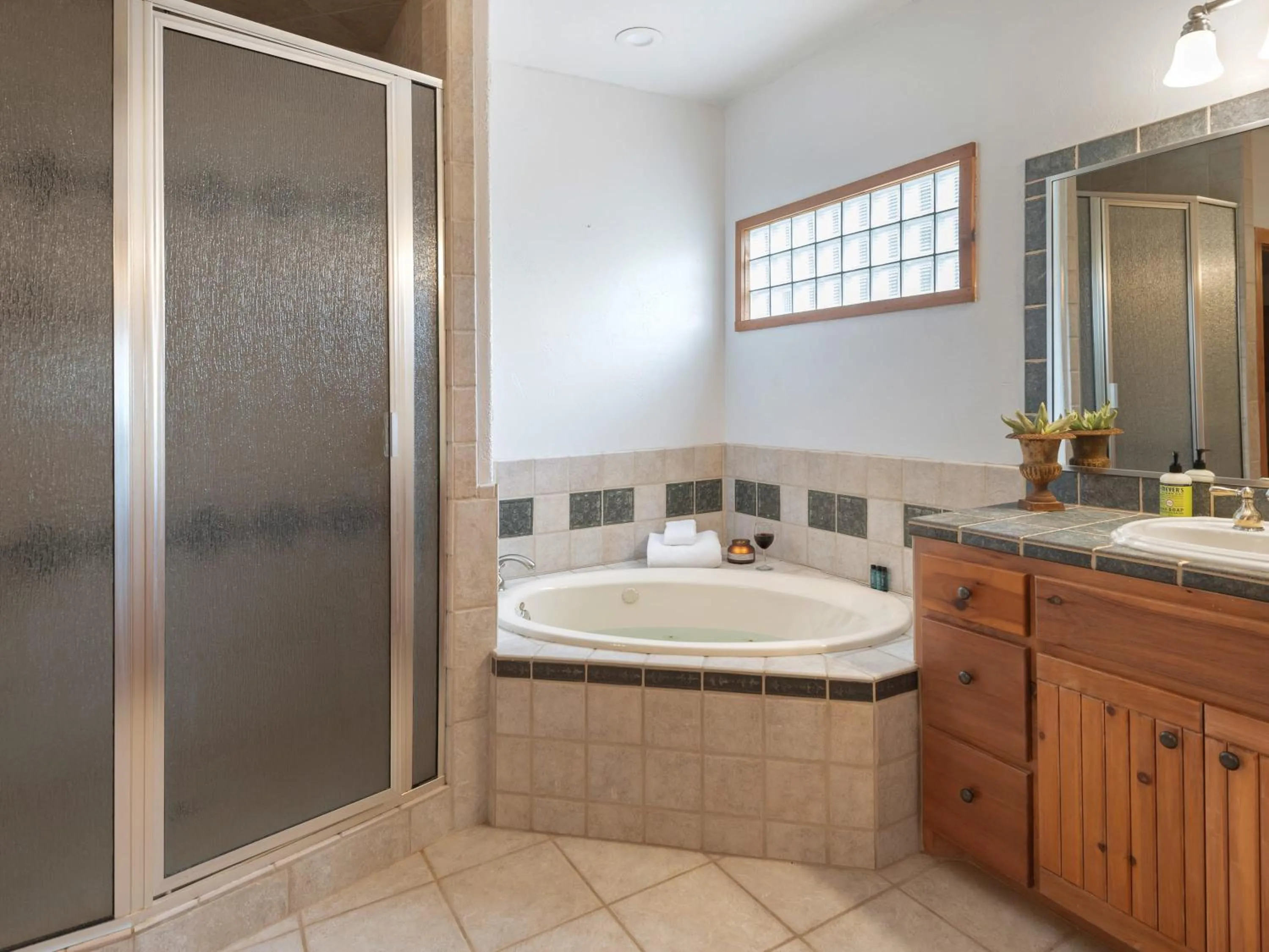 Waterfront Home with Boat Slip, Spacious Outdoor Patio and a Fenced Yard