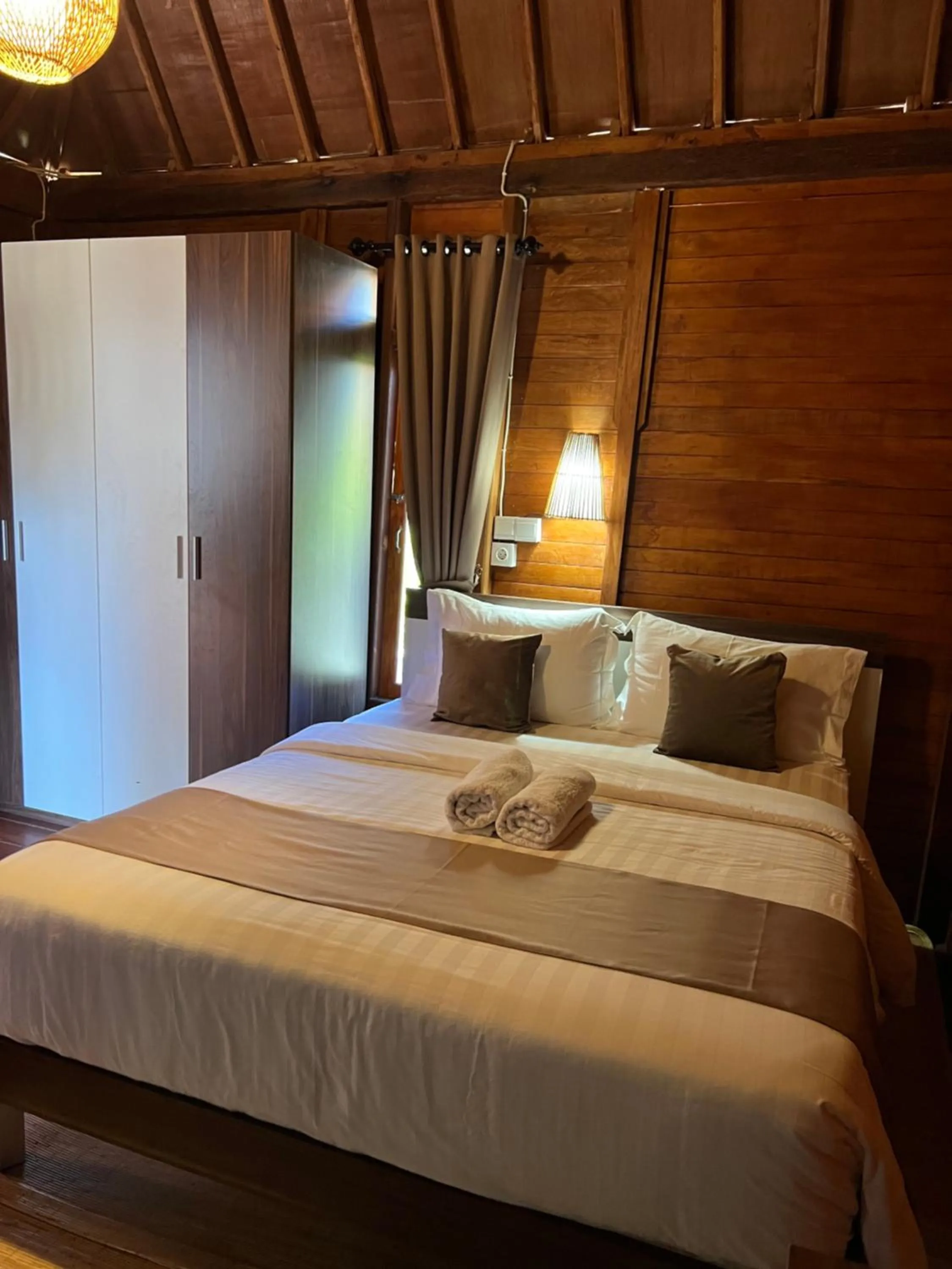 Bed in ADIKARA TROPICAL GARDEN