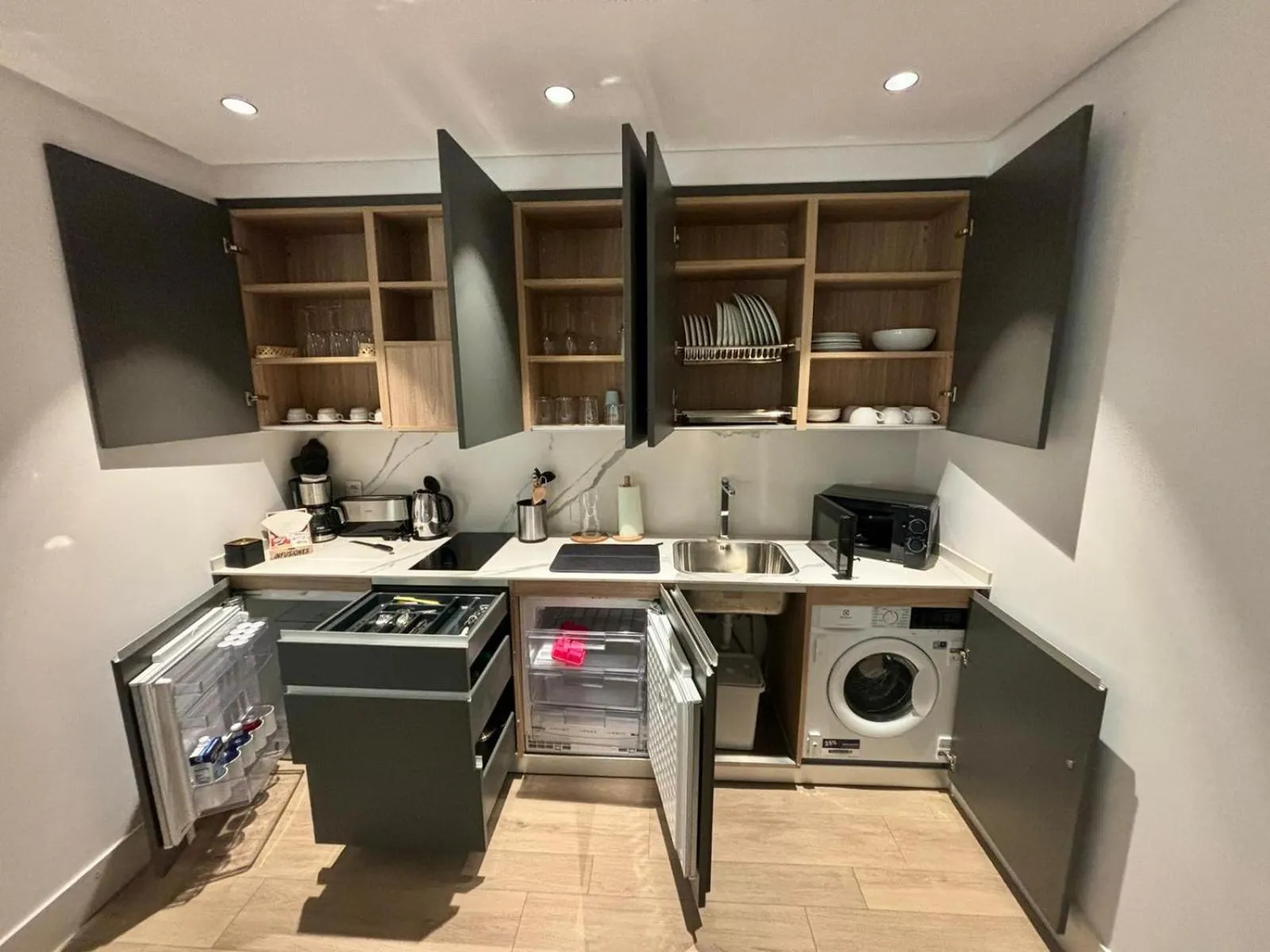 Kitchen or kitchenette in Apartamentos Turísticos La Plaza