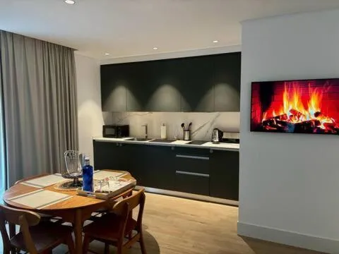 TV and multimedia in Apartamentos Turísticos La Plaza