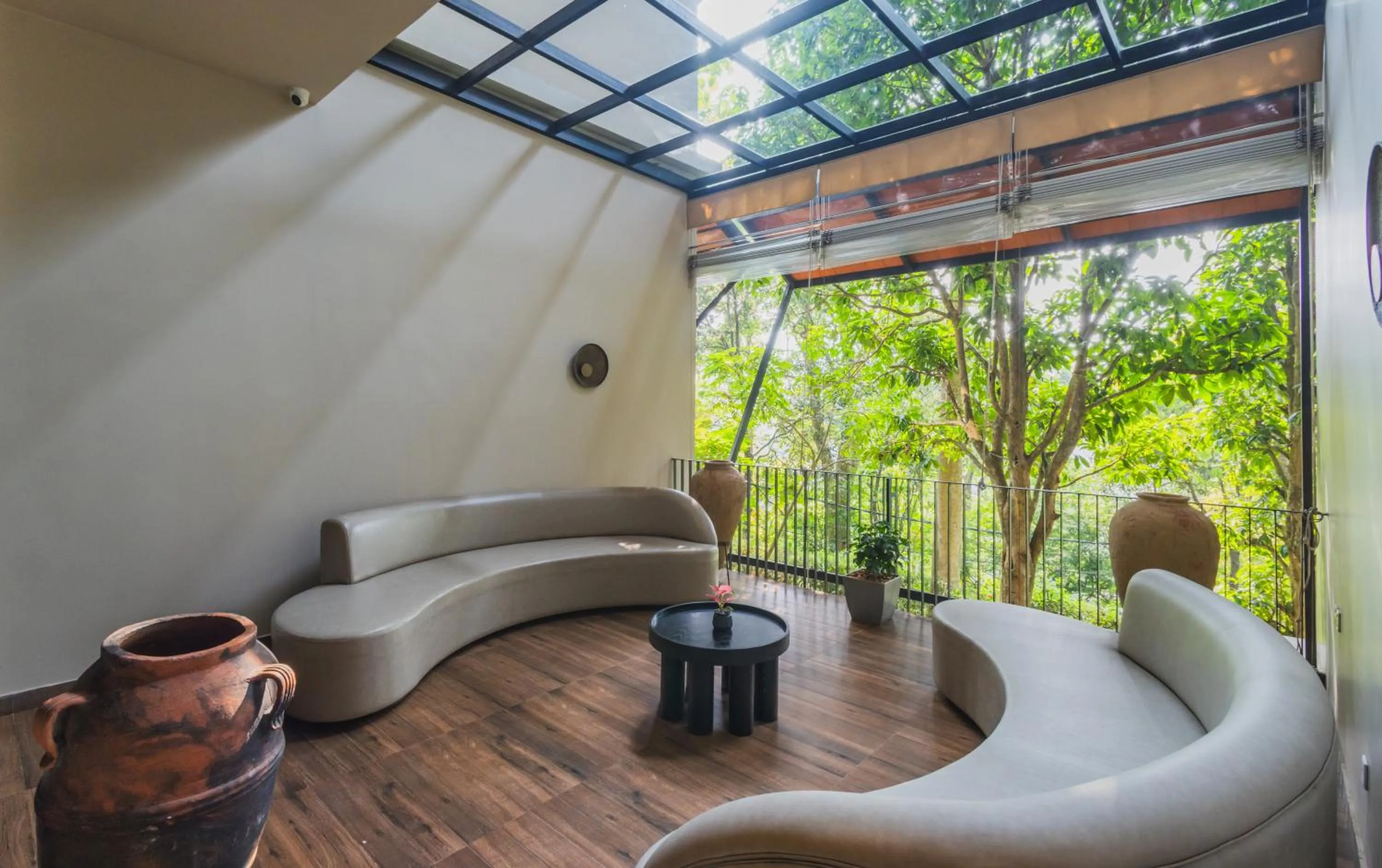 Seating area in Flora Vythiri Resort Wayanad