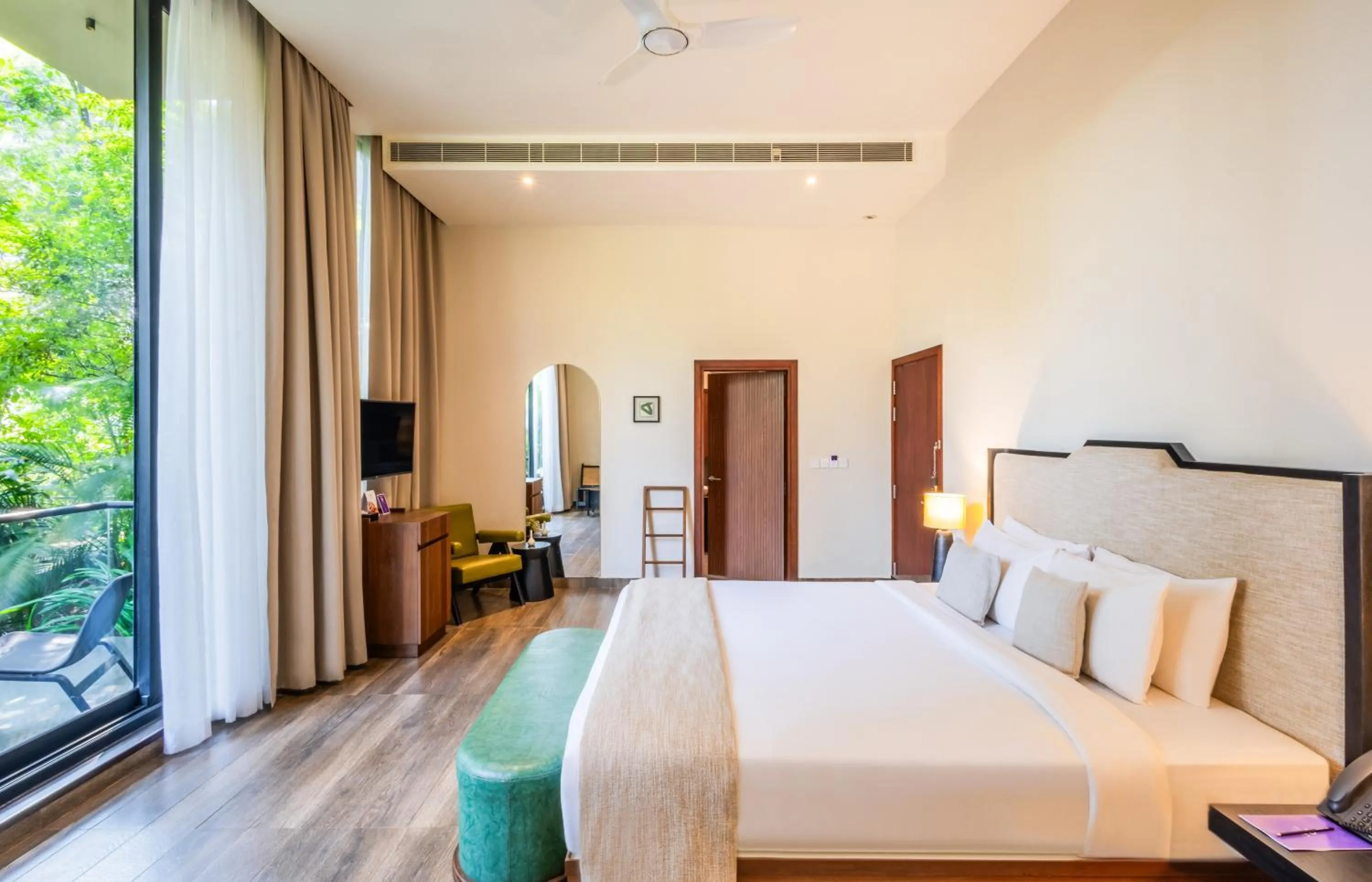 Bed in Flora Vythiri Resort Wayanad