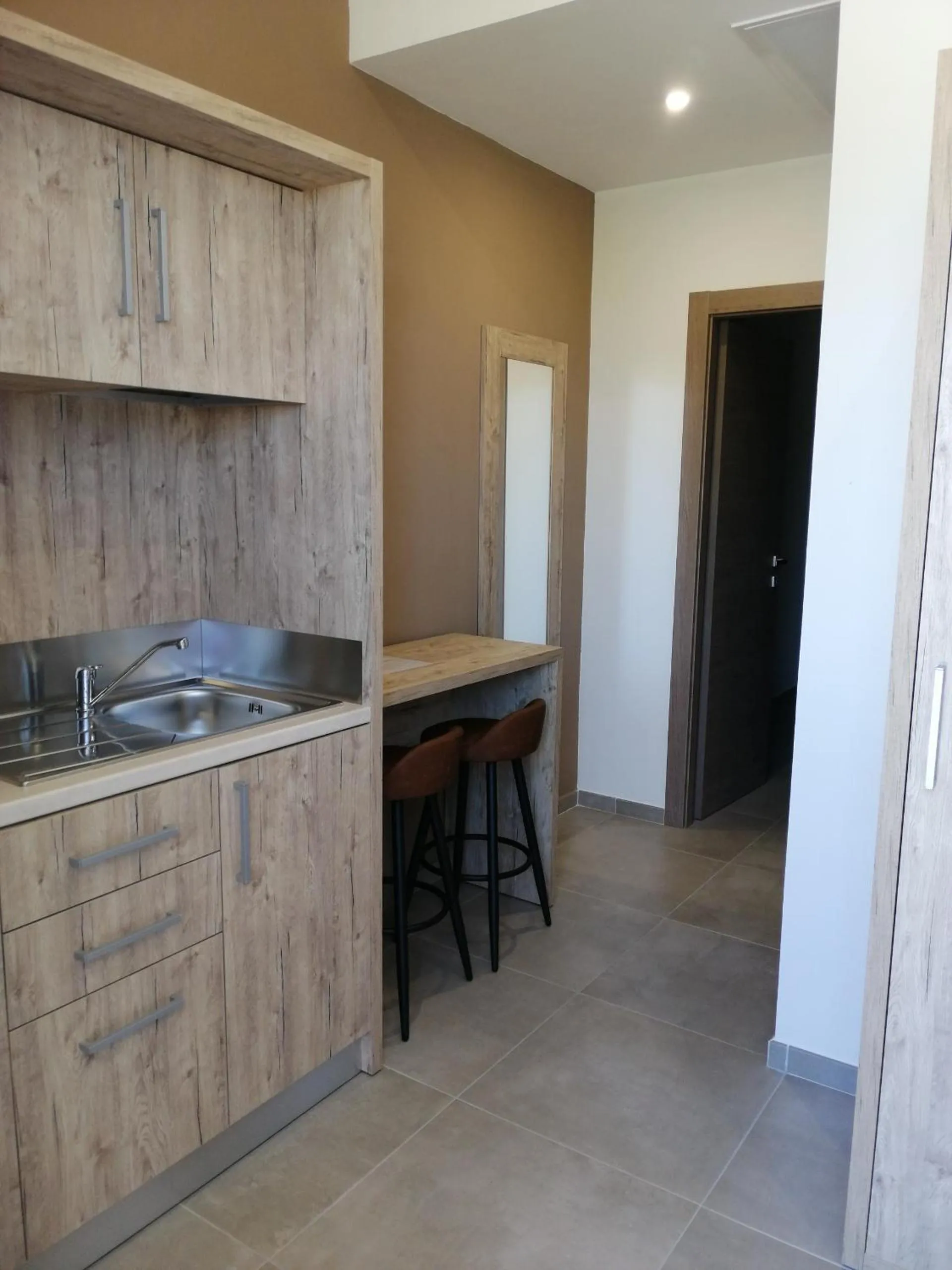 Kitchen or kitchenette in Aia Grande