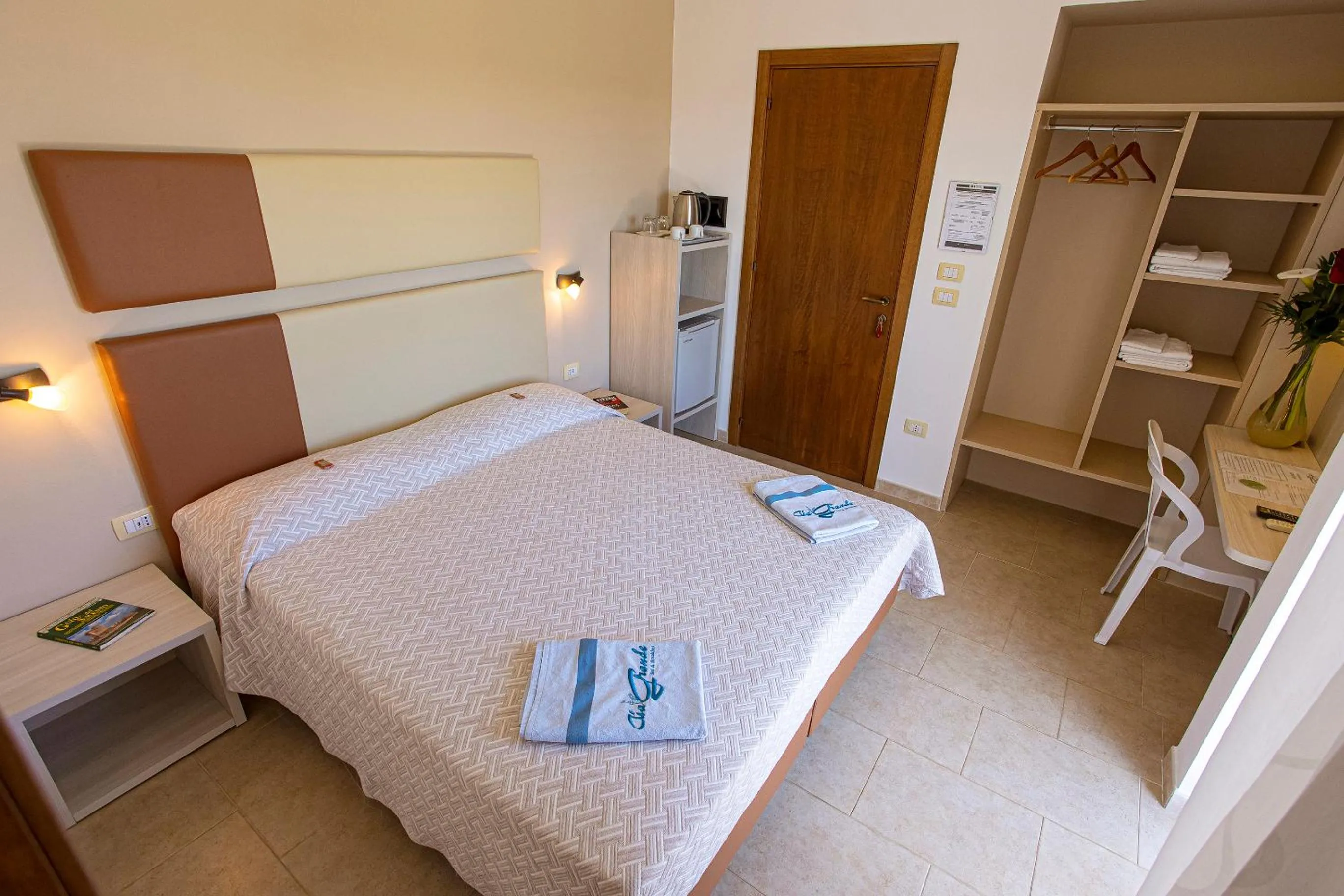 Photo of the whole room, Bed in Aia Grande