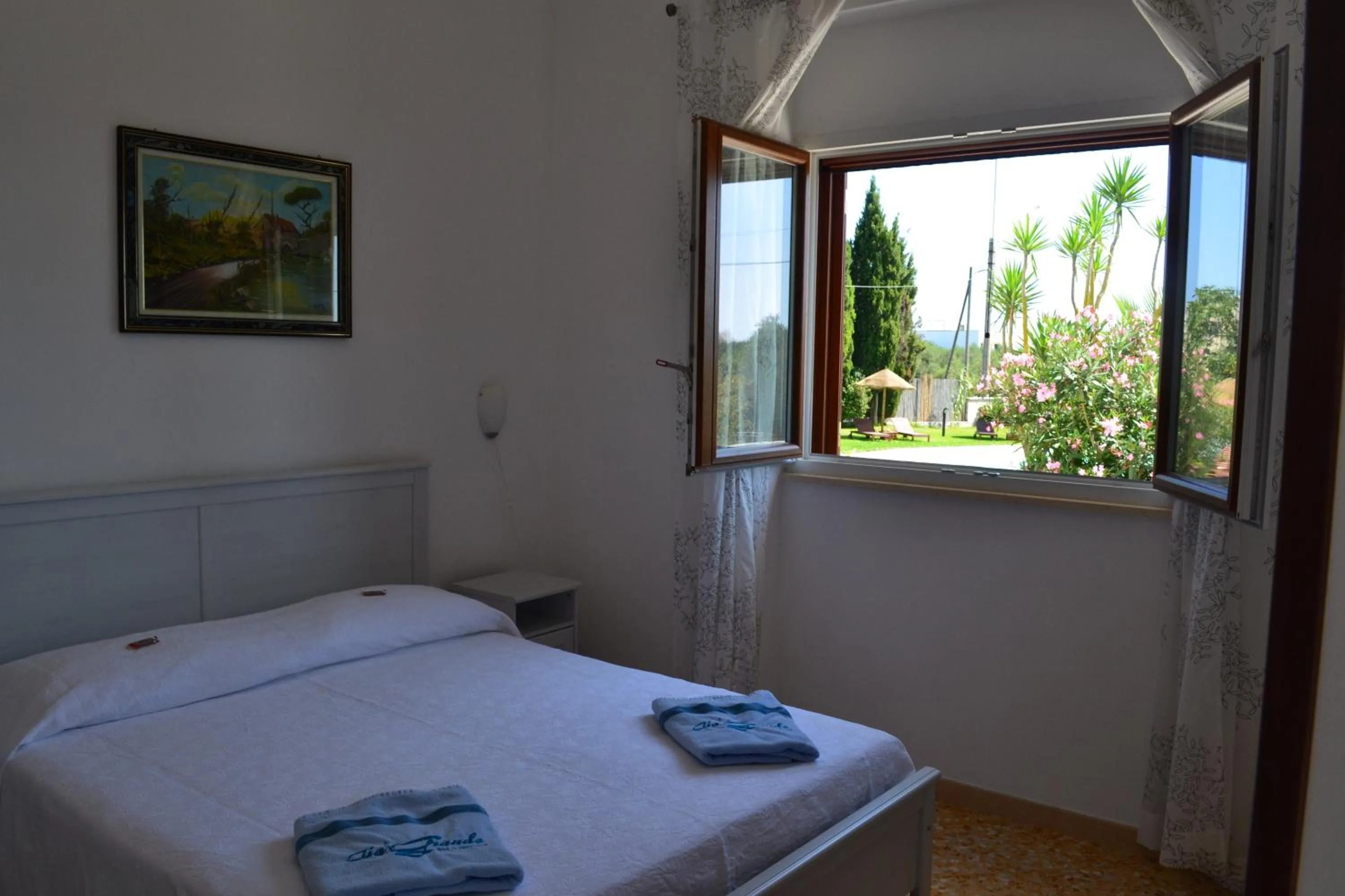 Photo of the whole room, Bed in Aia Grande