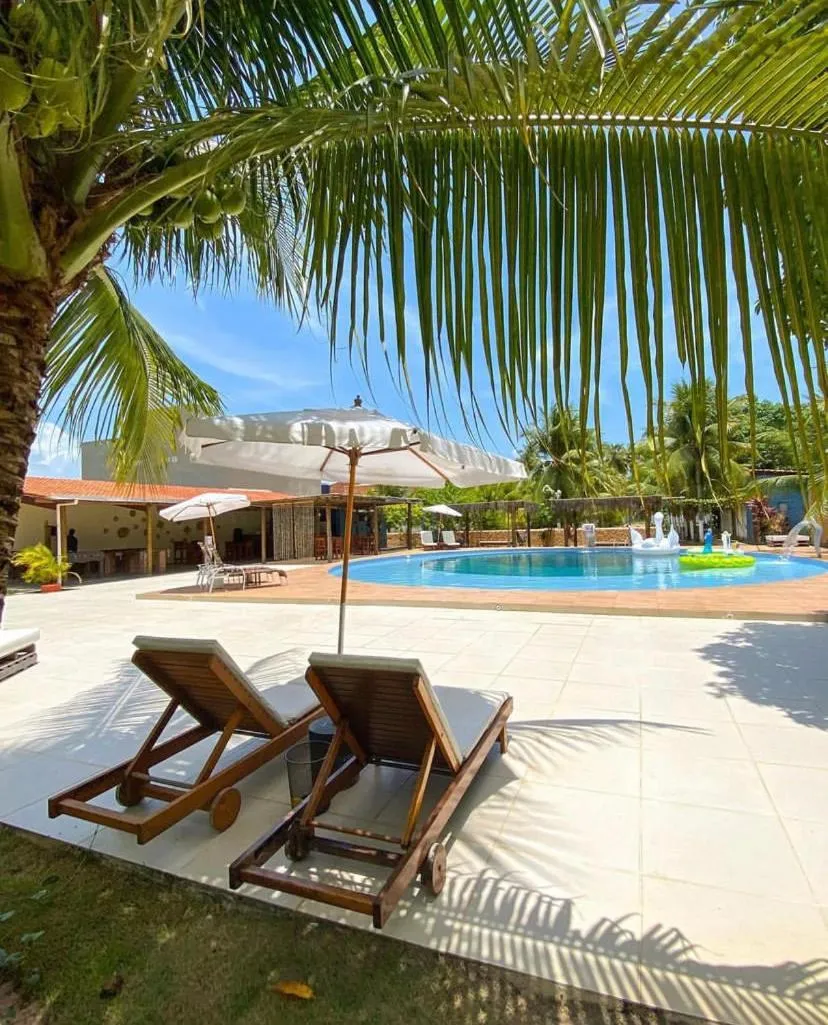 Swimming pool in Pousada o Casarão