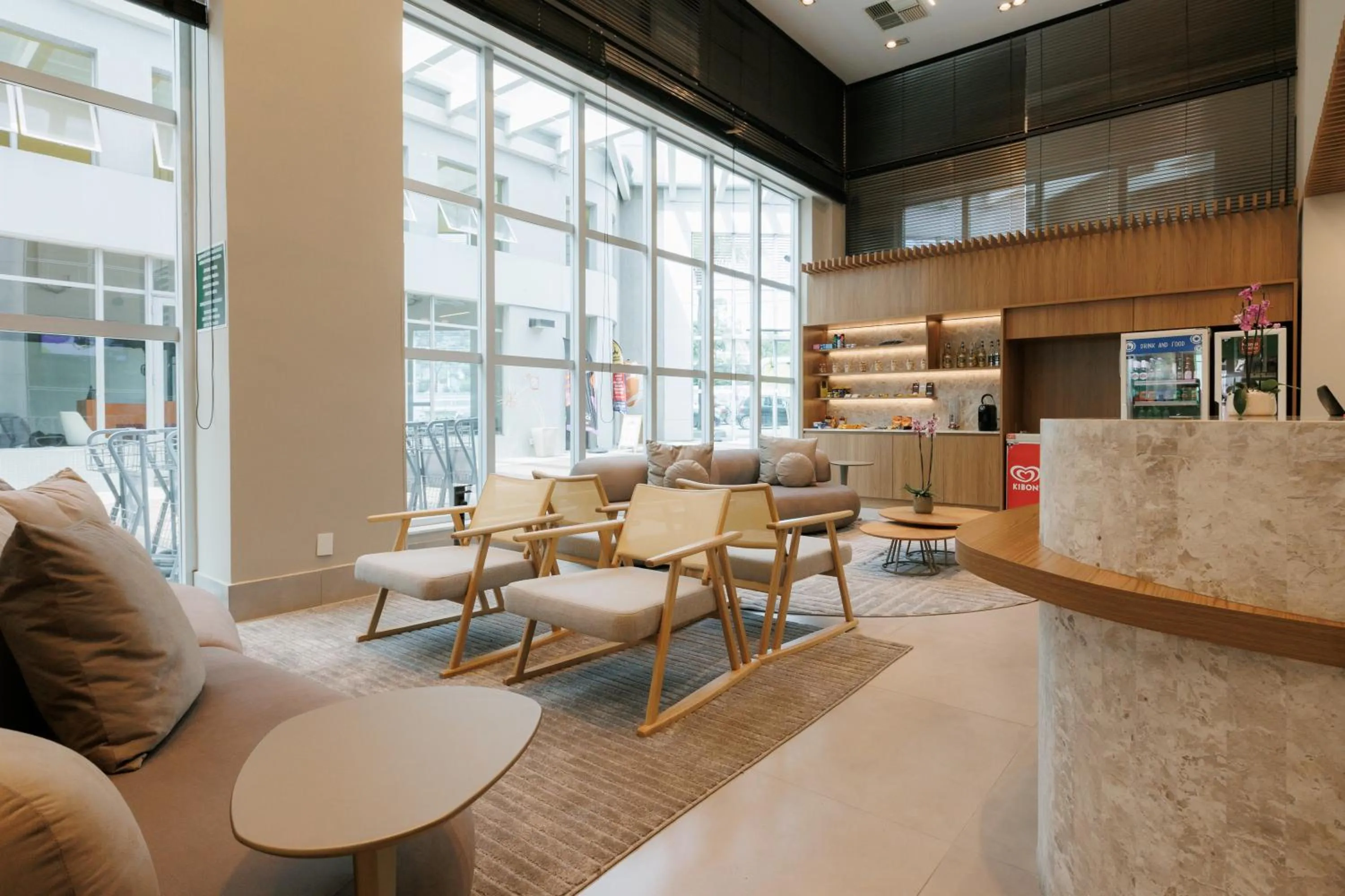 Lobby or reception in eSuites Belo Horizonte Minascasa