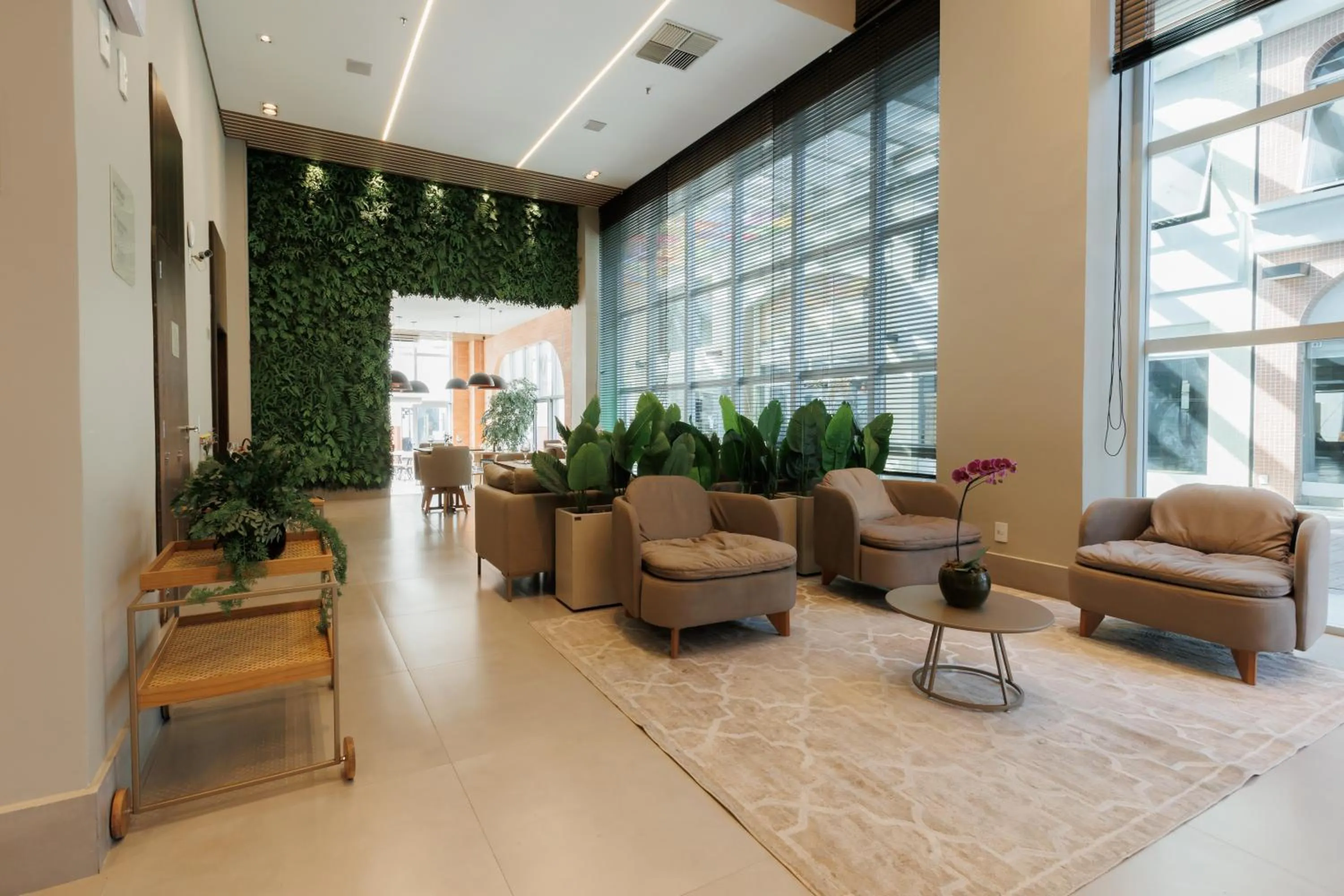Lobby or reception in eSuites Belo Horizonte Minascasa