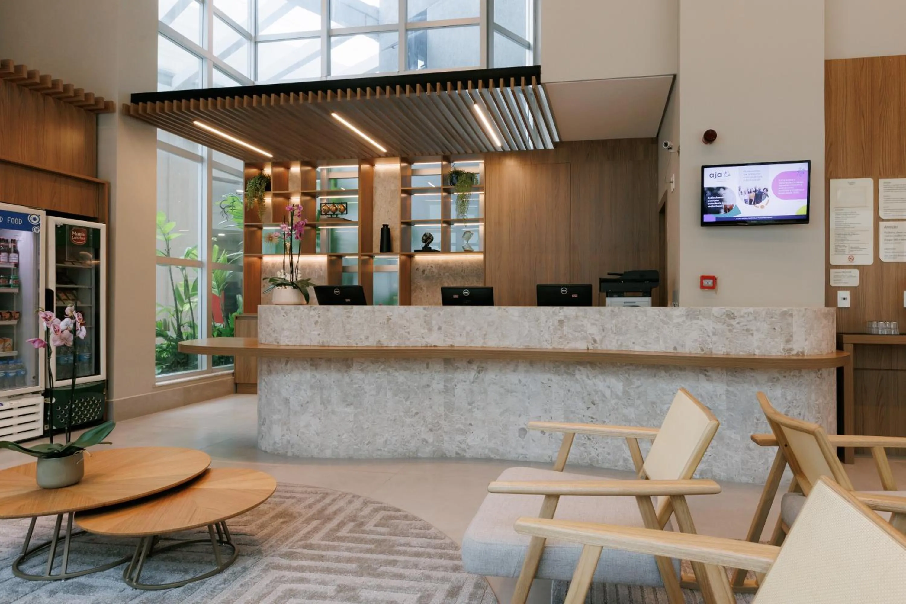 Lobby or reception in eSuites Belo Horizonte Minascasa