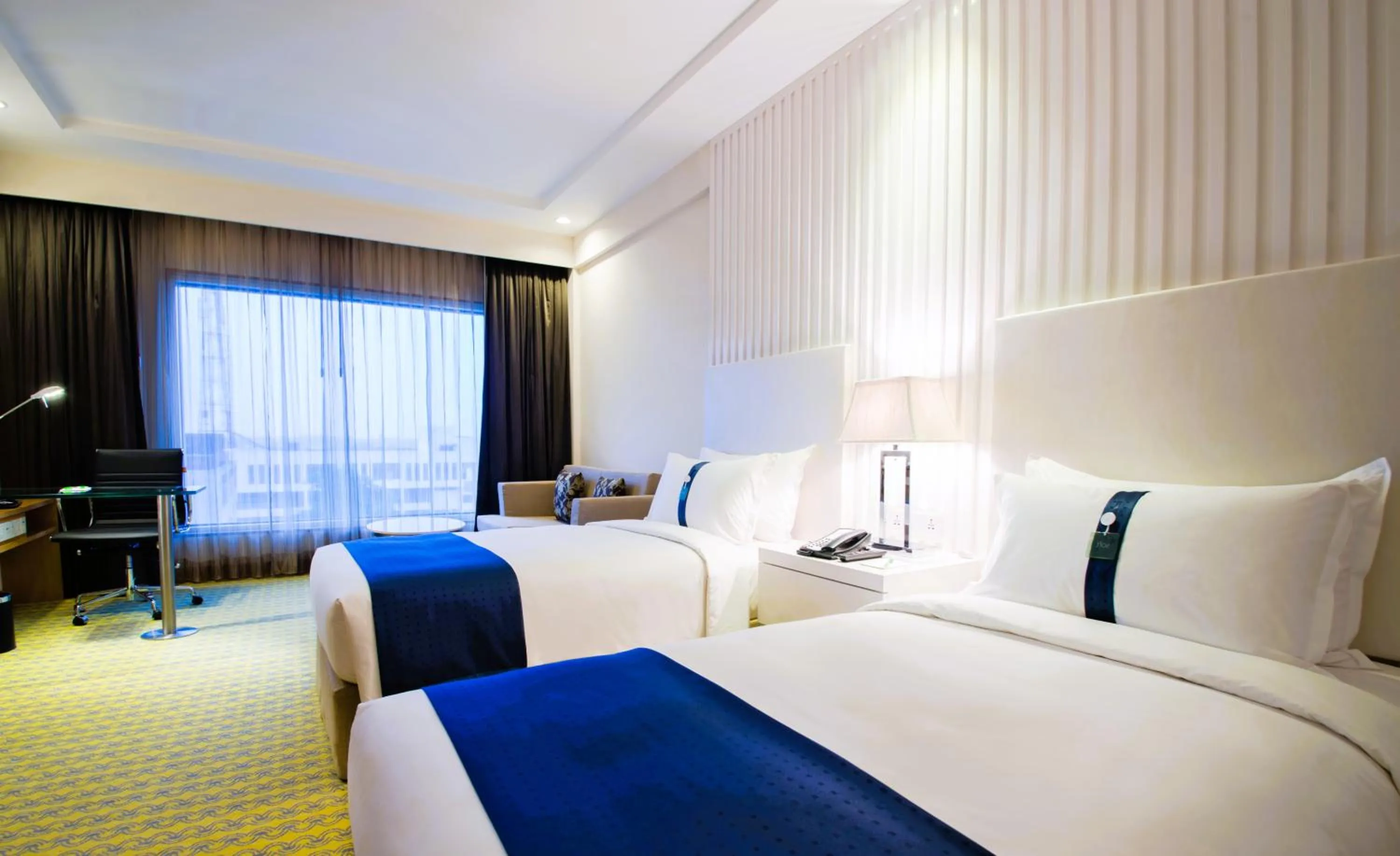 Bedroom, Bed in Holiday Inn Amritsar Ranjit Avenue by IHG