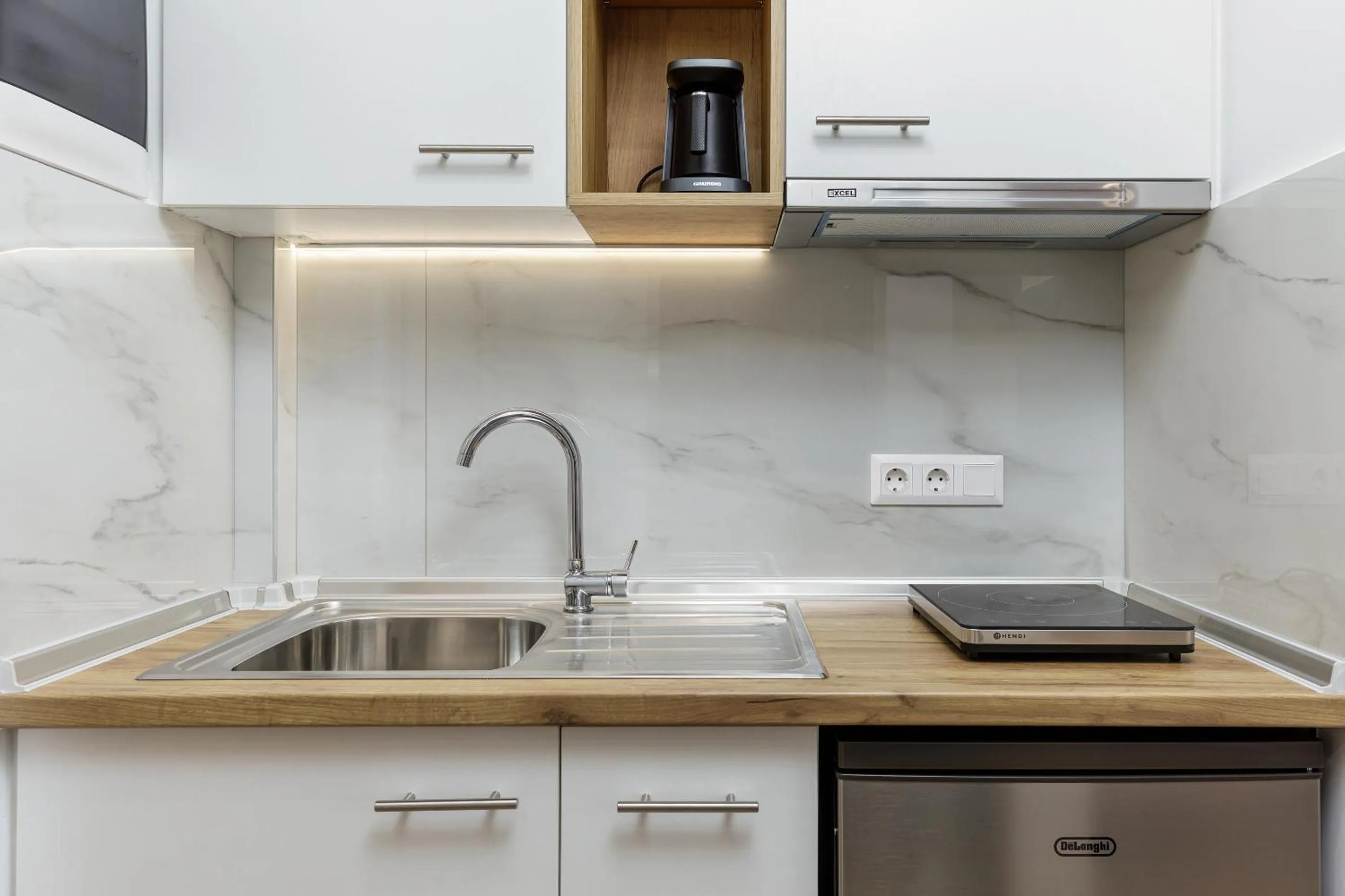 Kitchen or kitchenette in Anassa Suites