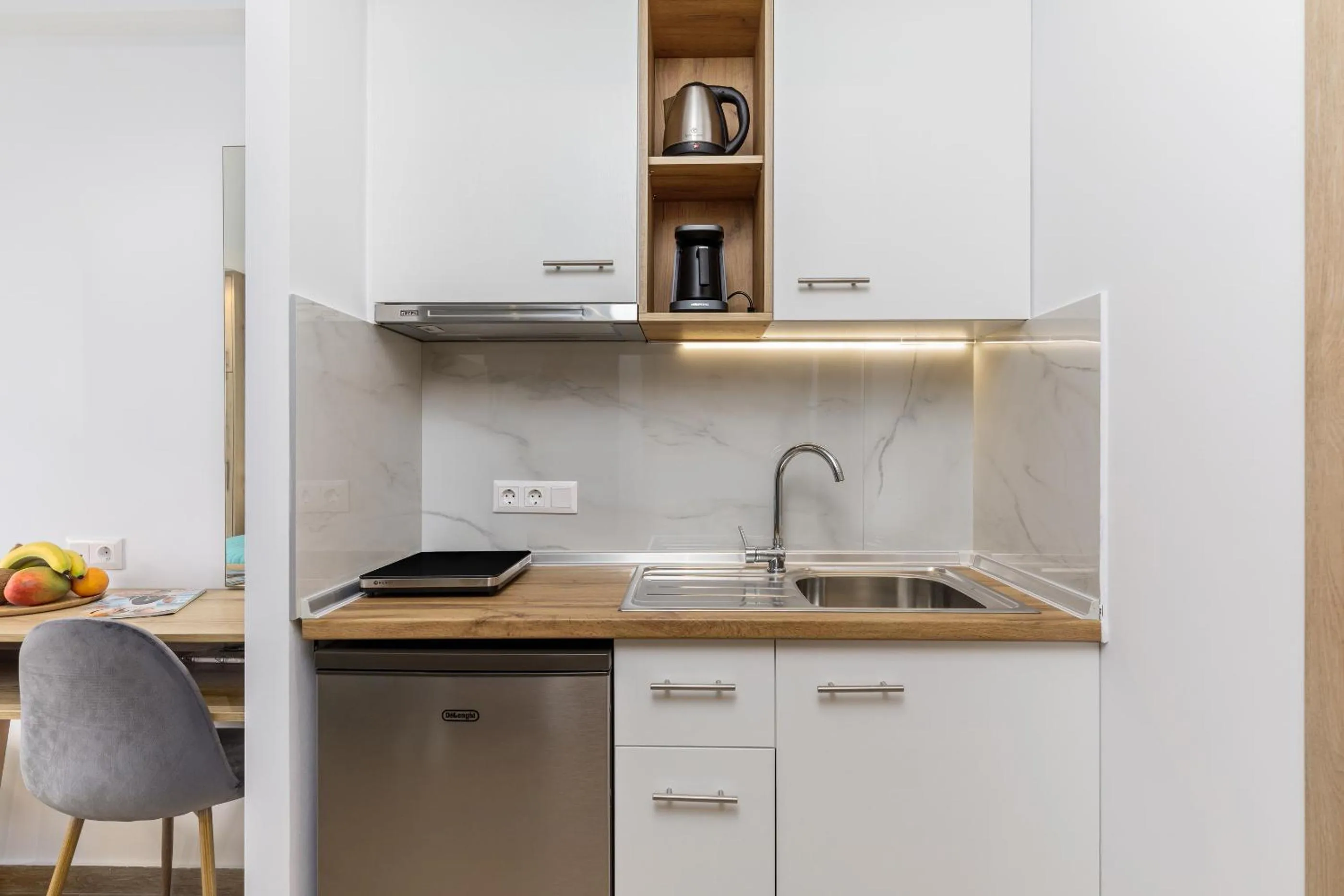 Kitchen or kitchenette in Anassa Suites