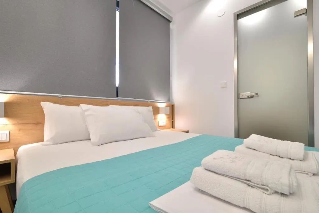 Bed in Anassa Suites