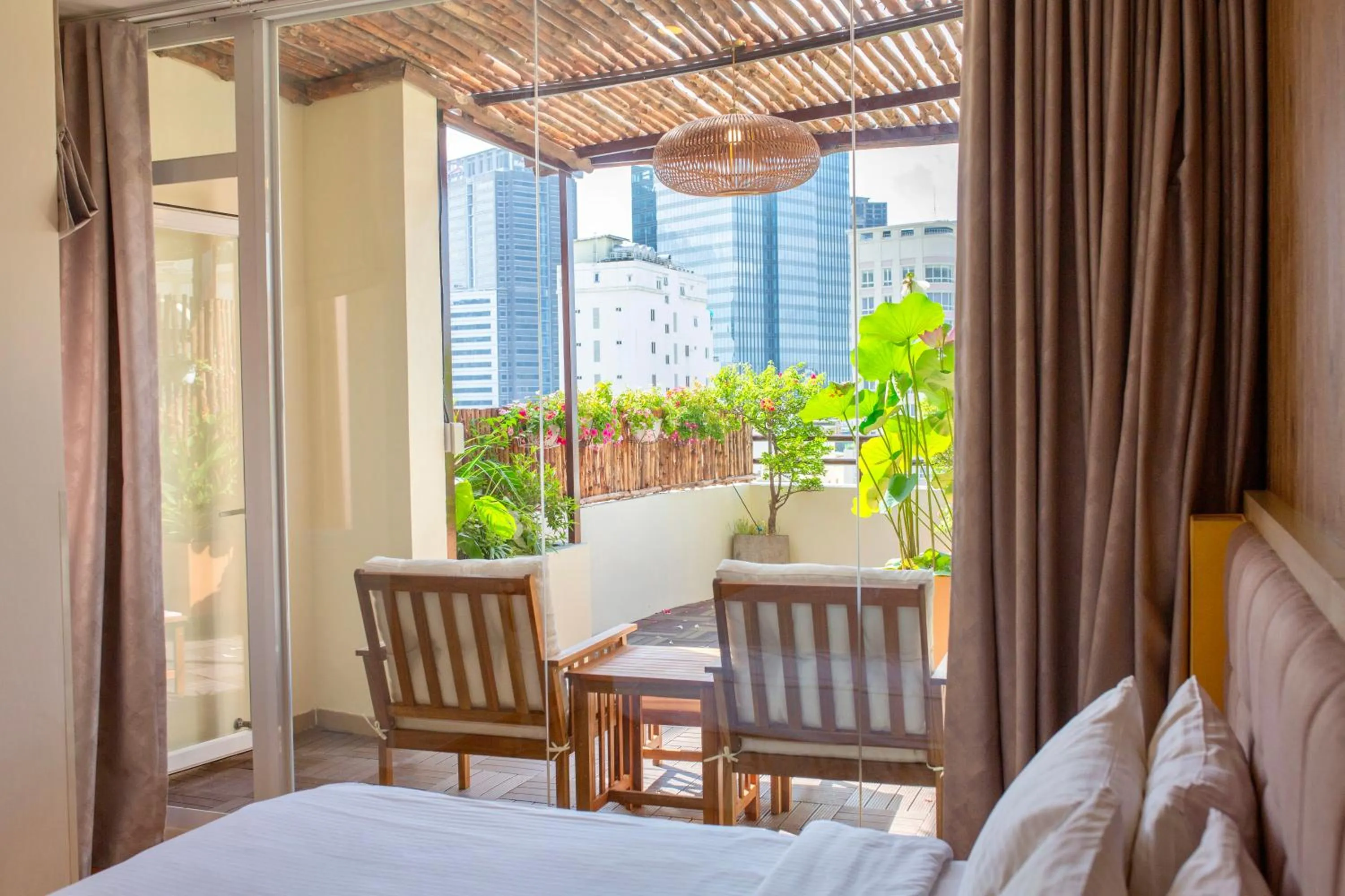 Garden view, Bed in GK Central Hotel