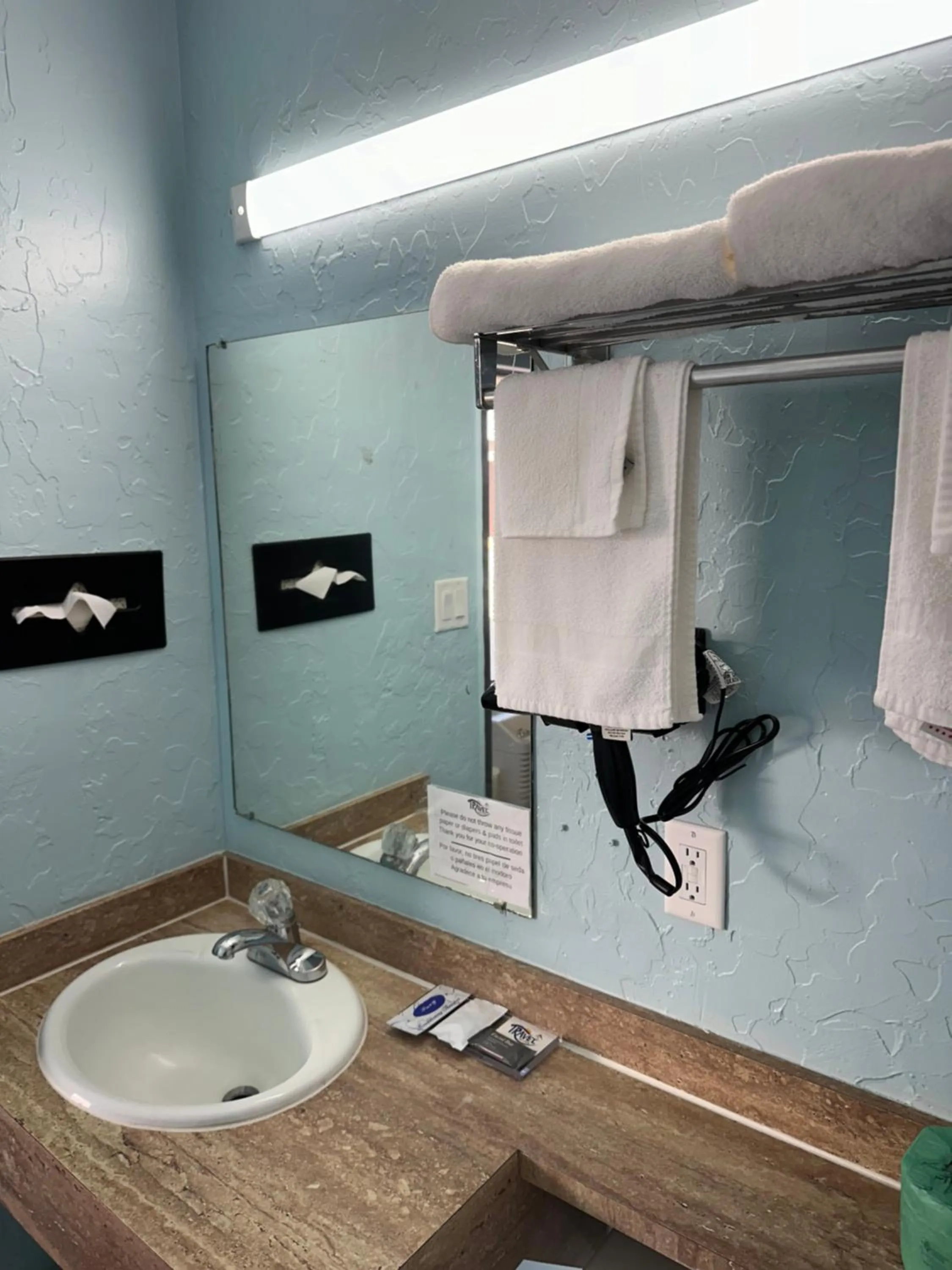 Bathroom in Travel Inn & Suites