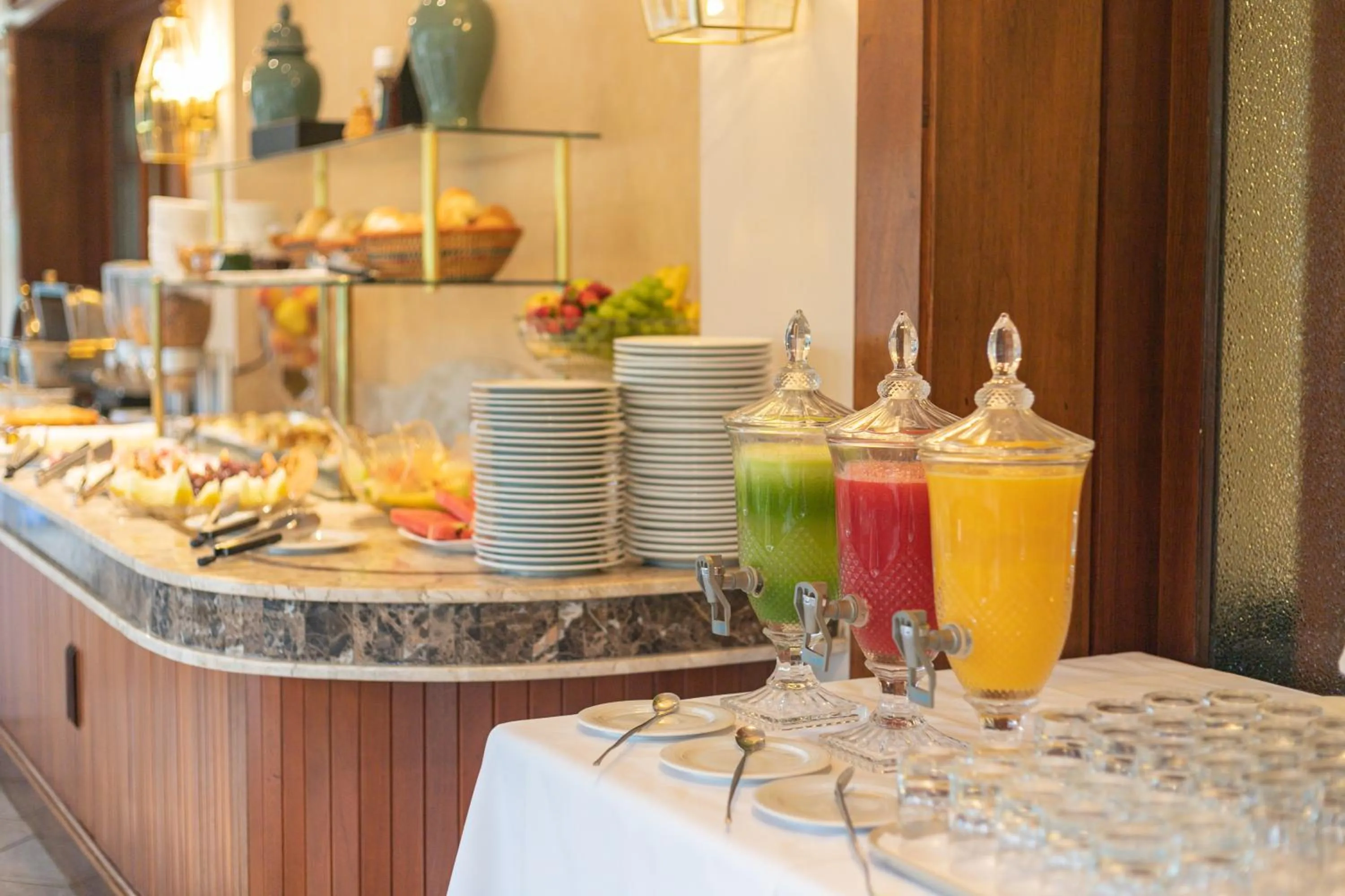 Buffet breakfast in Le Suisse Elegance Hotel