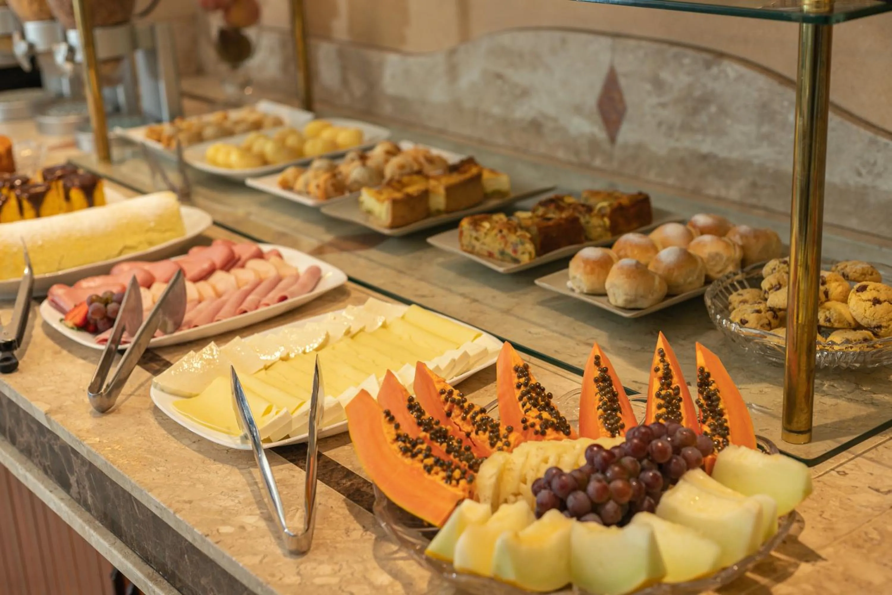 Buffet breakfast in Le Suisse Elegance Hotel