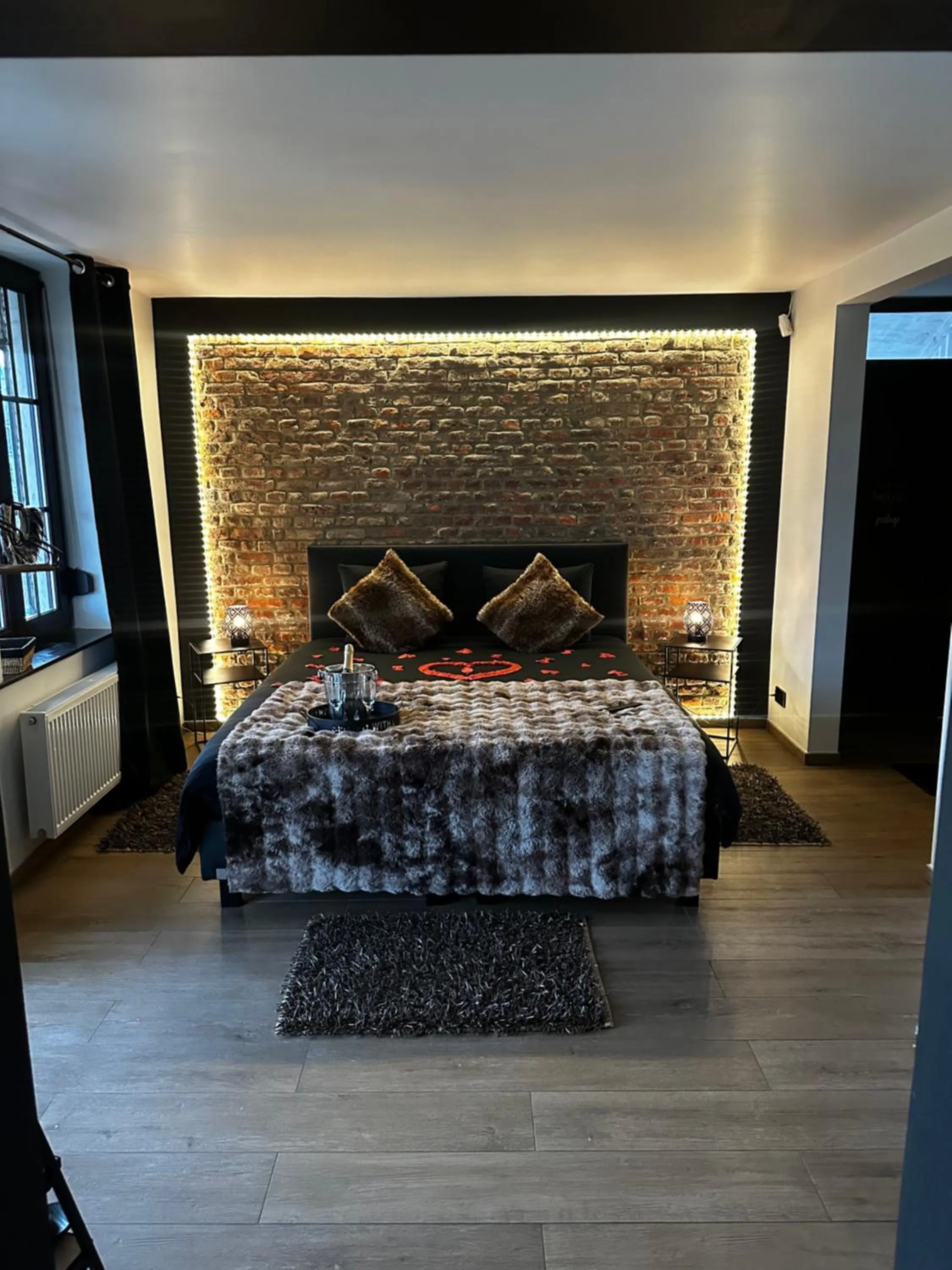Bed in Suite Tino - Jacuzzi privé, cabine infrarouge & vue