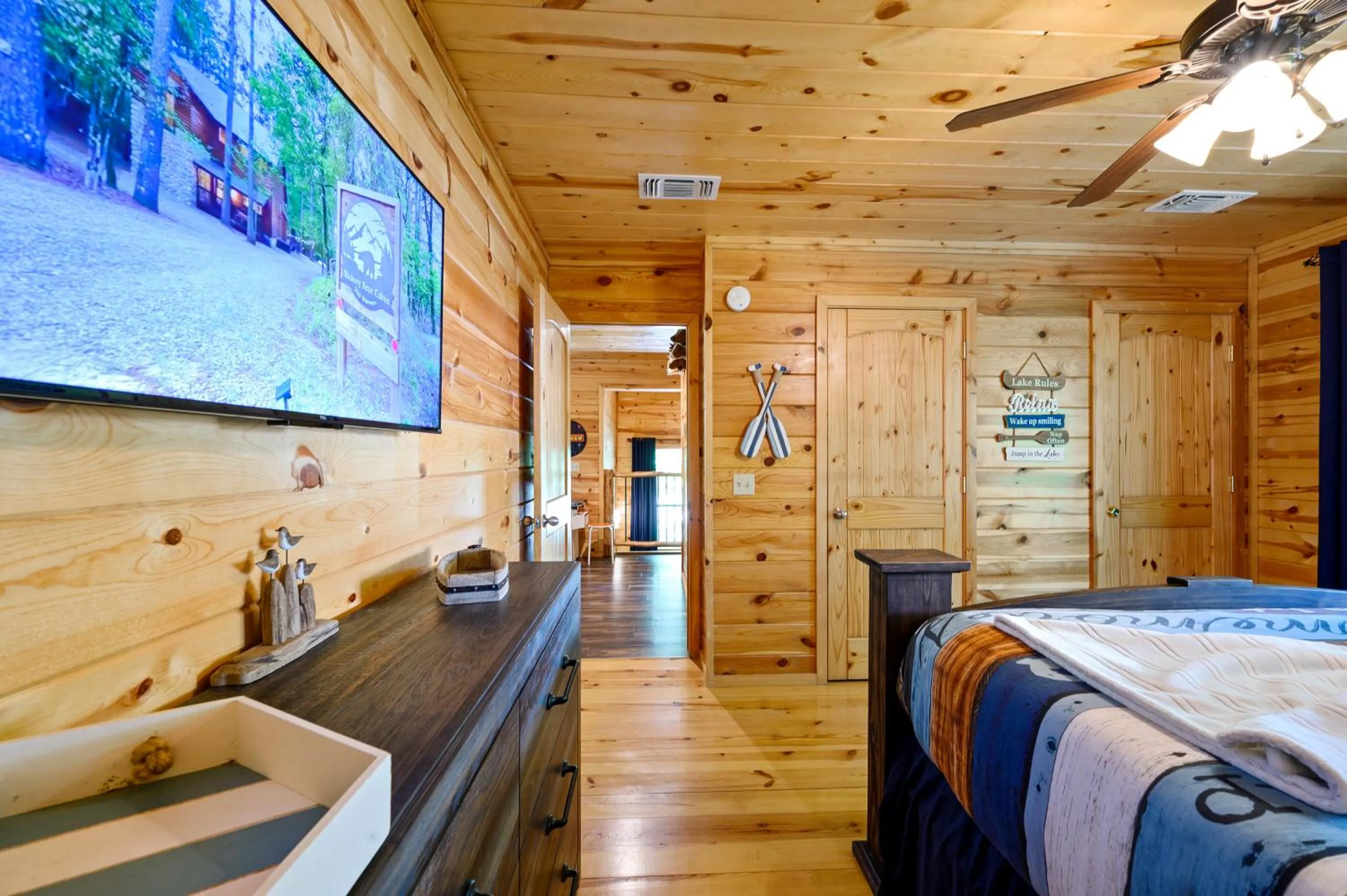 Bedroom, Bed in Hickory Bear - Cabin surrounded by pines, Sleeps 10, Hot Tub, Fire Pit, Arcade, Foosball Table & Deck Slide