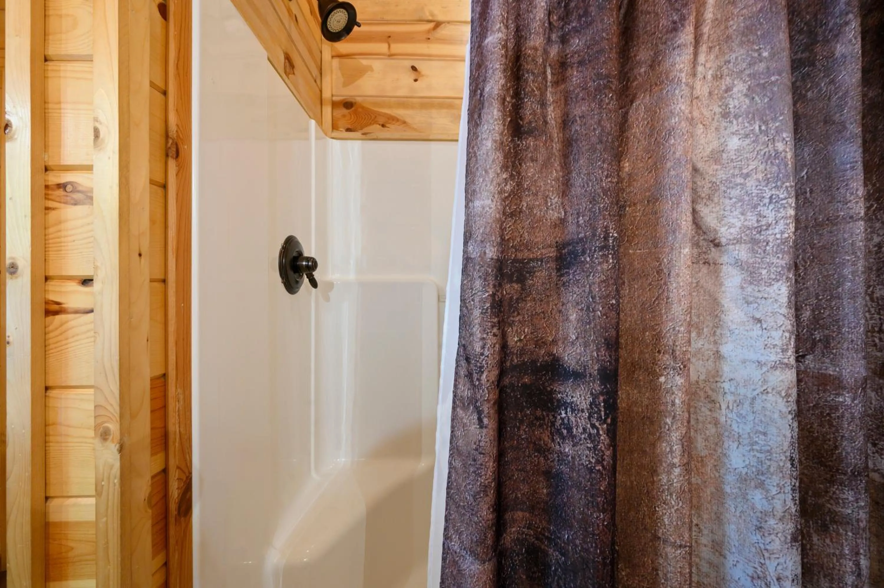 Shower in Hickory Bear - Cabin surrounded by pines, Sleeps 10, Hot Tub, Fire Pit, Arcade, Foosball Table & Deck Slide