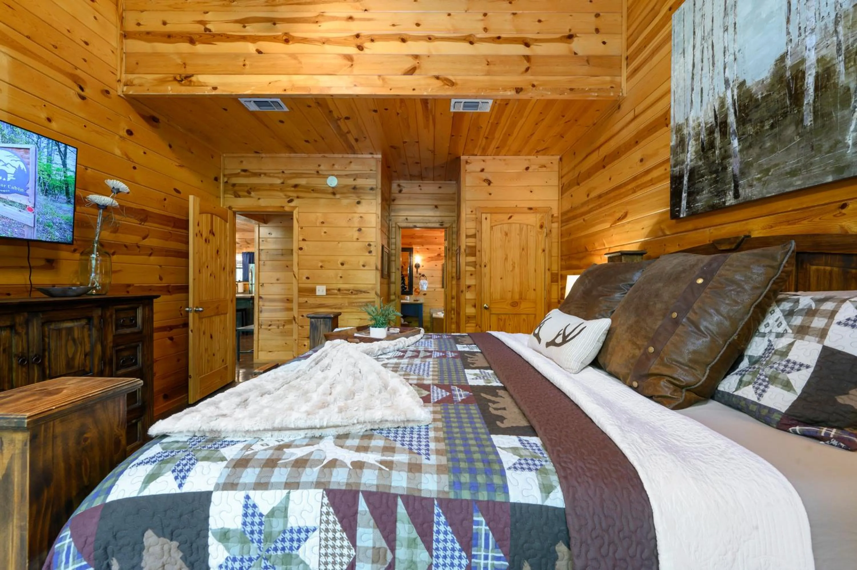 Bedroom, Bed in Hickory Bear - Cabin surrounded by pines, Sleeps 10, Hot Tub, Fire Pit, Arcade, Foosball Table & Deck Slide