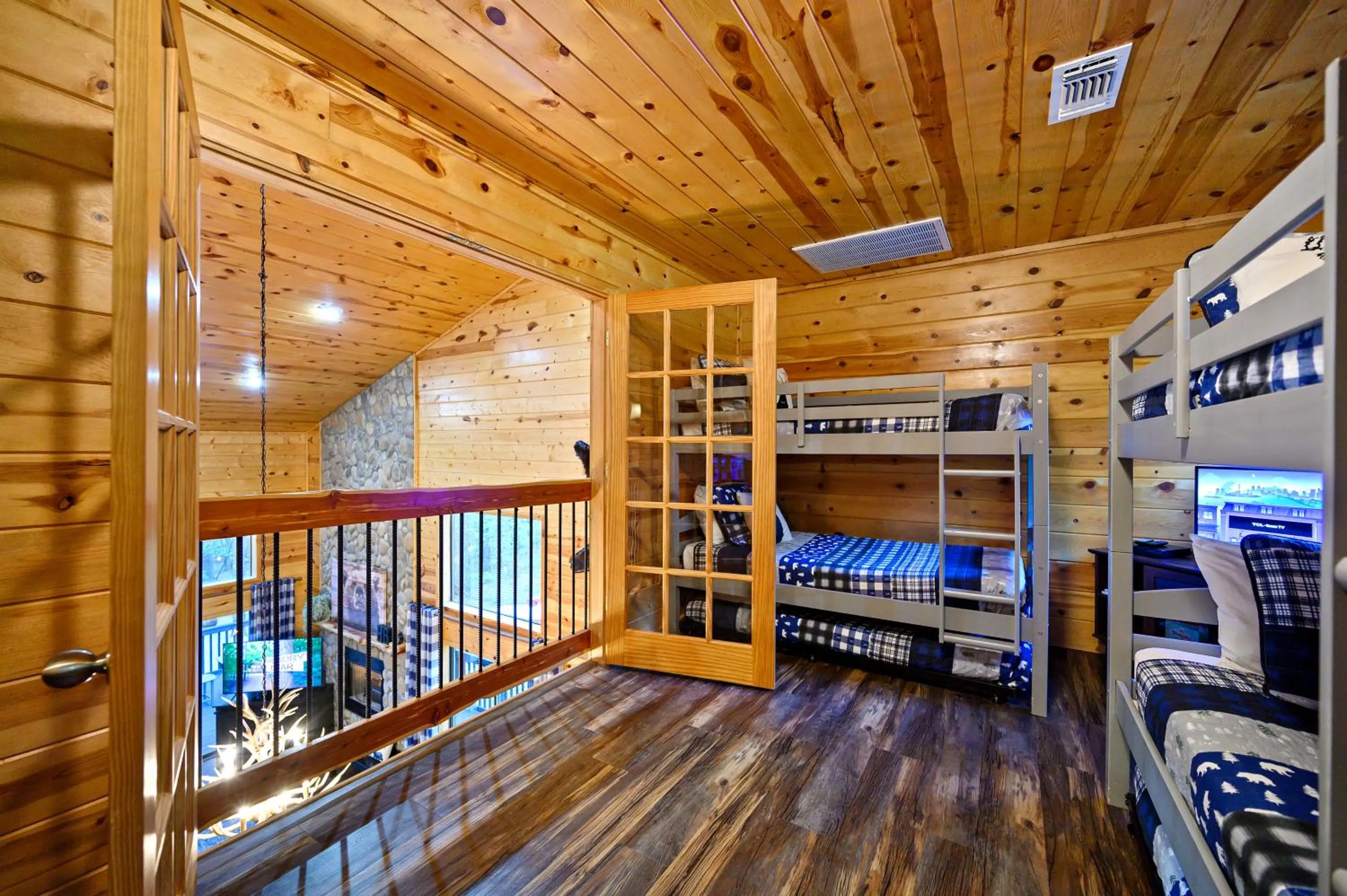 Bed in Hickory Bear - Cabin surrounded by pines, Sleeps 10, Hot Tub, Fire Pit, Arcade, Foosball Table & Deck Slide