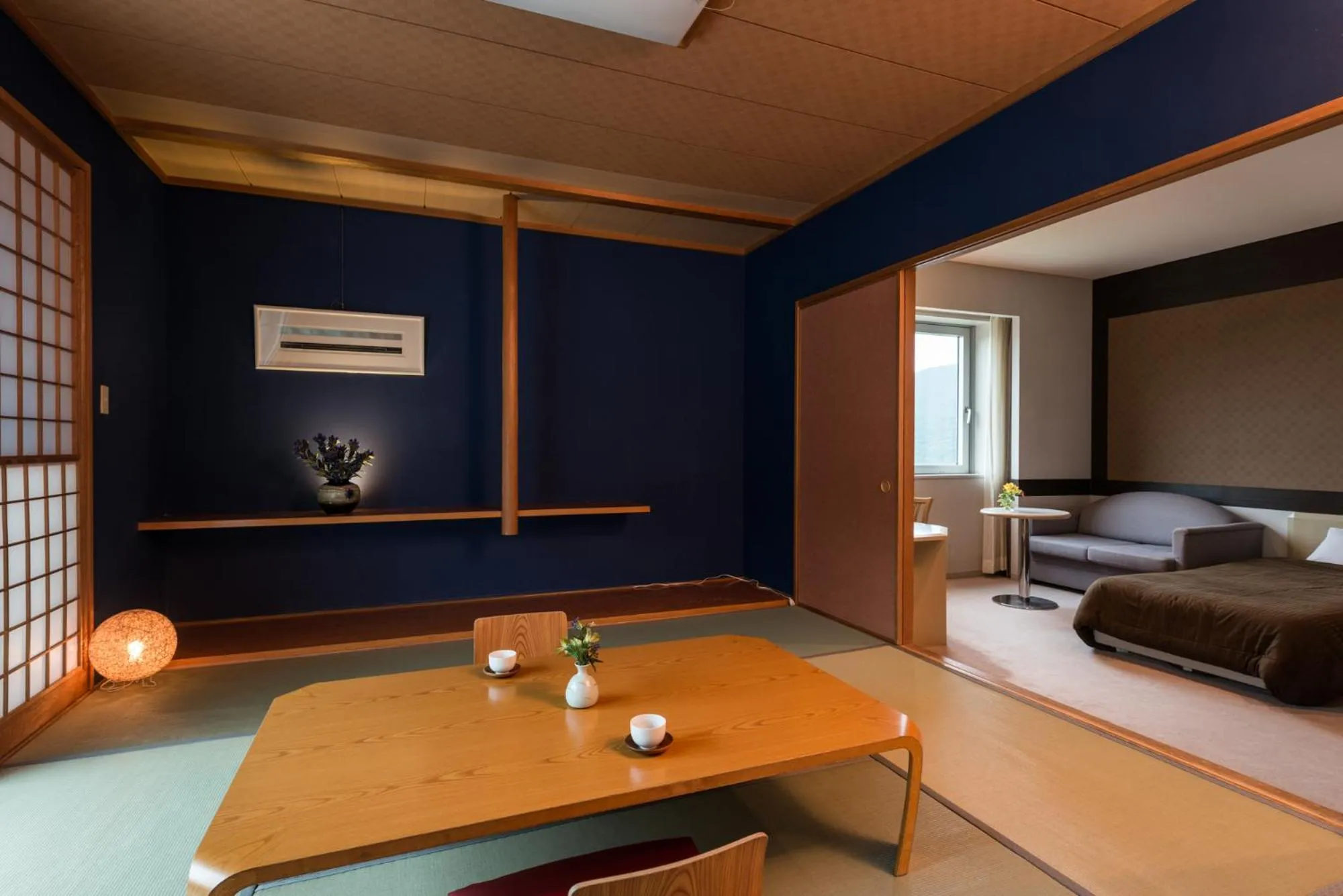 Bed in Takamiya Hotel Rurikura Resort