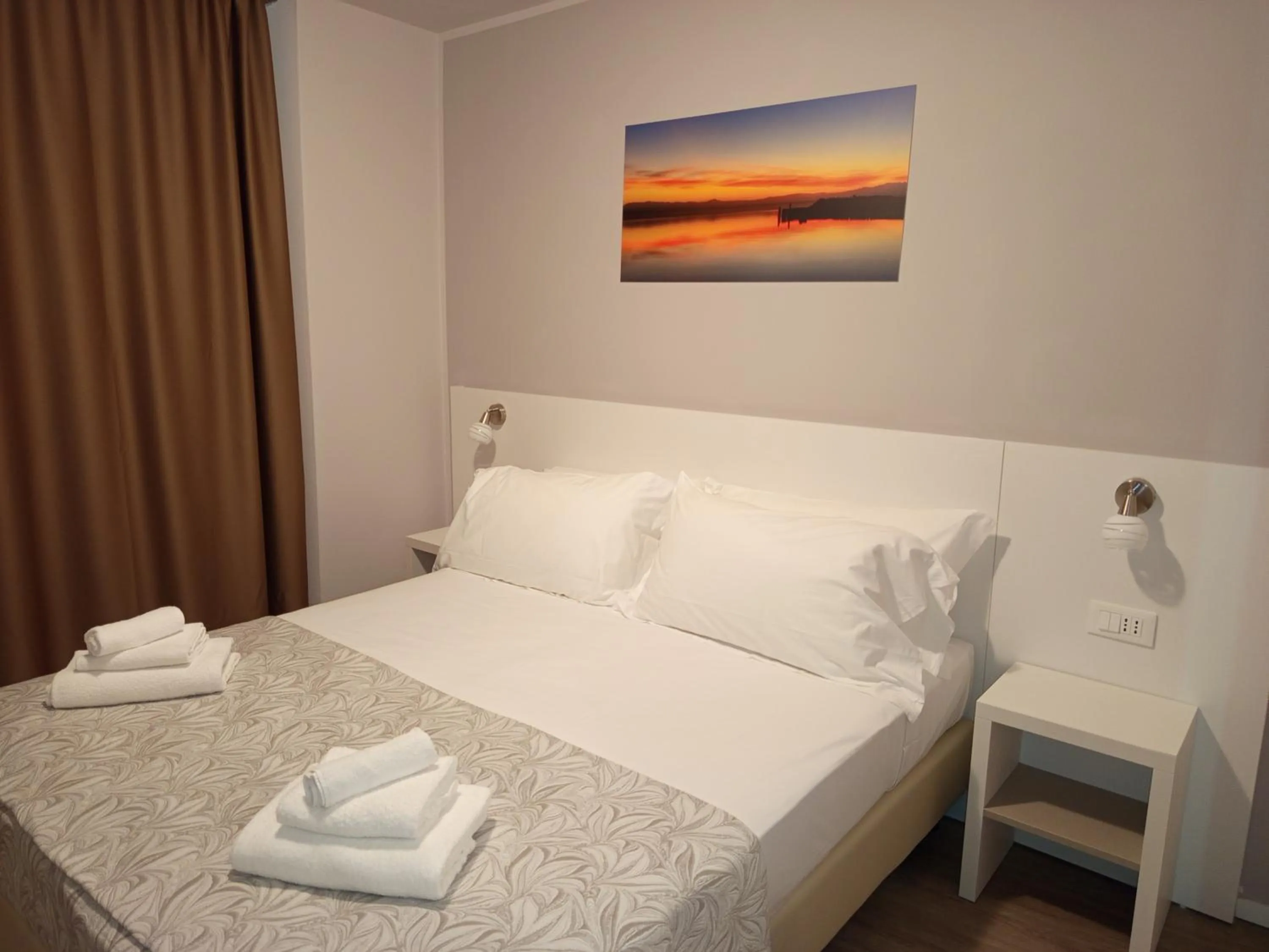 Bed in Hotel Acquario