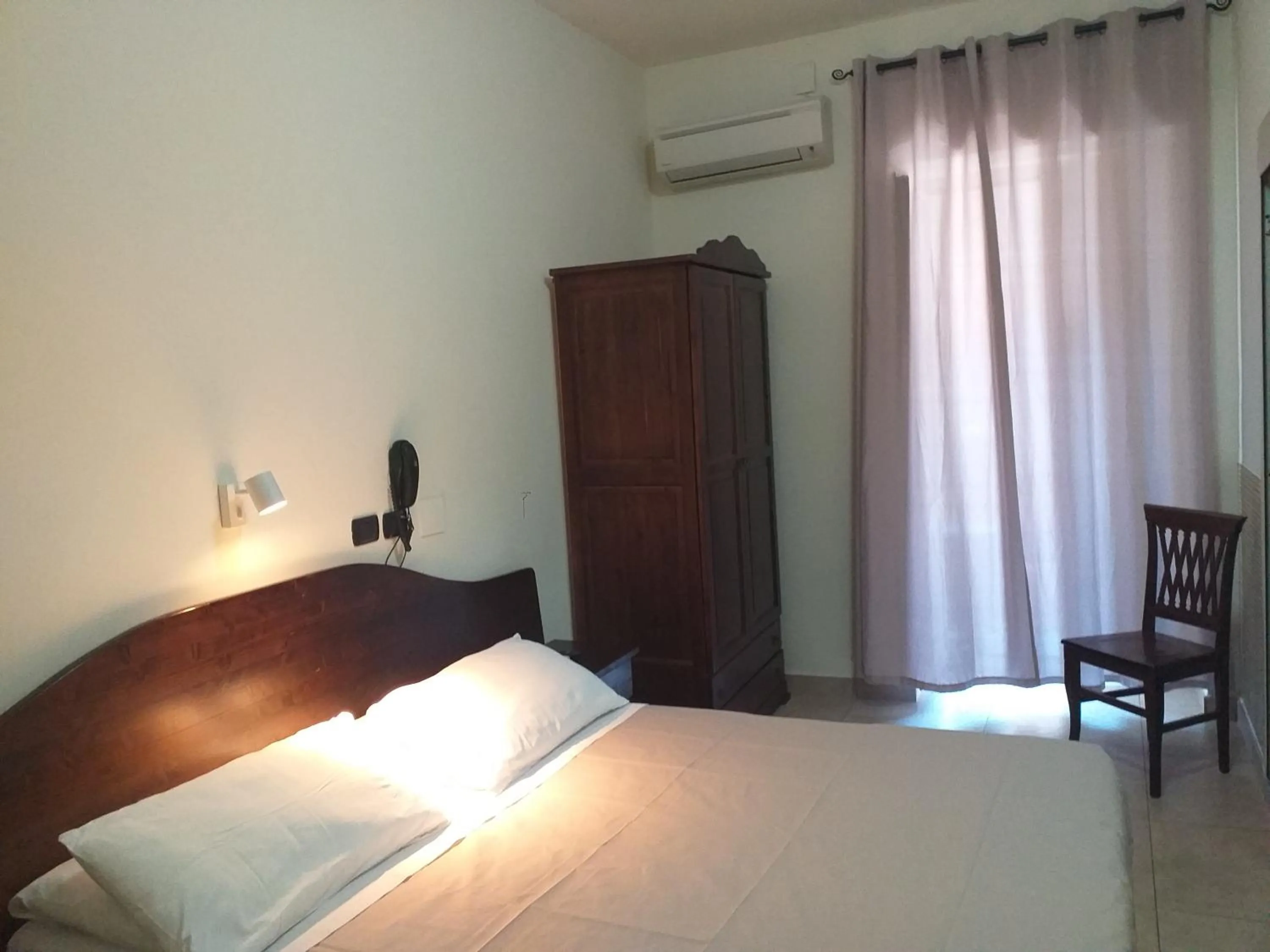 Photo of the whole room, Bed in Hotel Vittorio Veneto Napoli