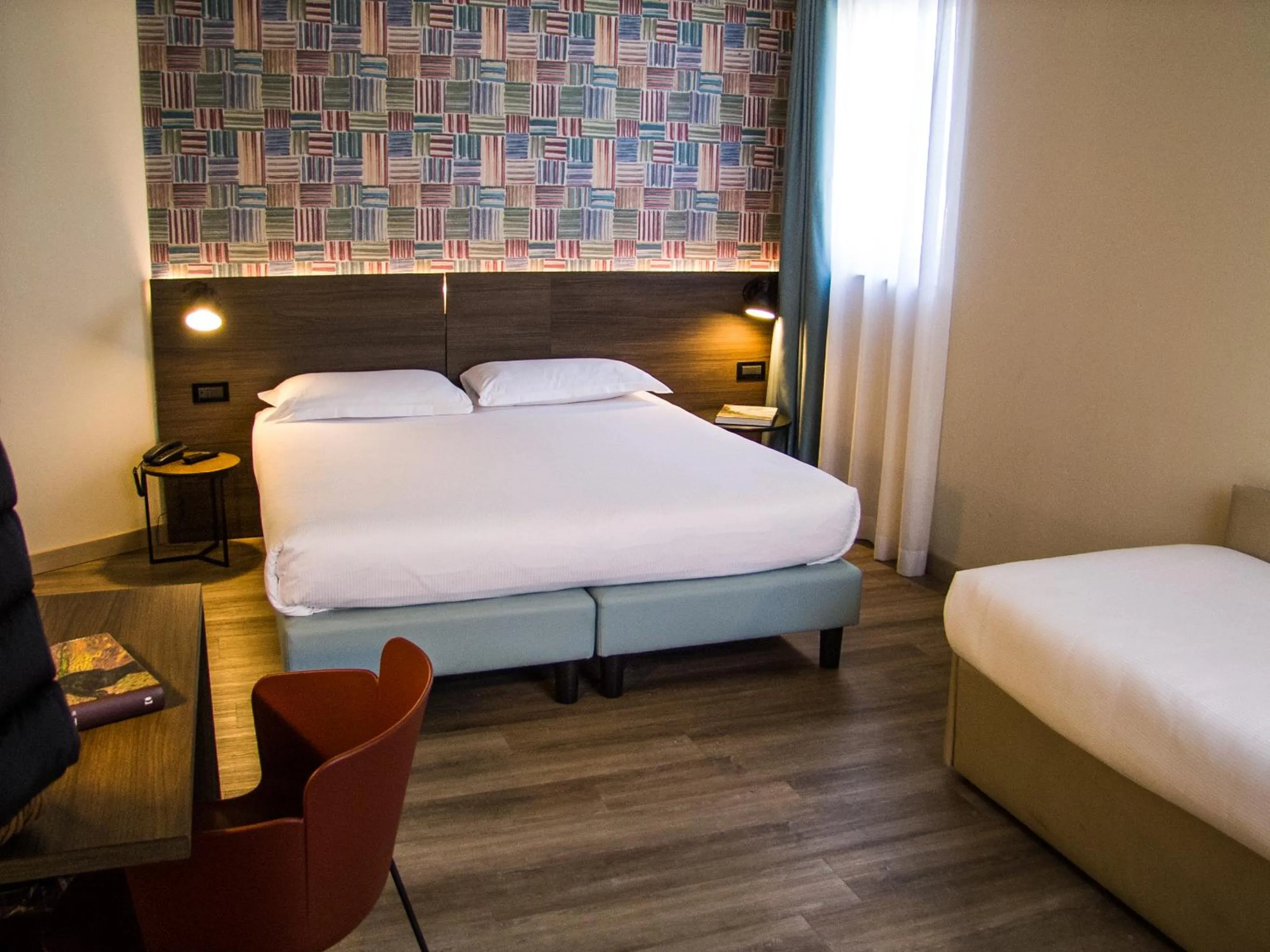 Bed in Hotel Ambra
