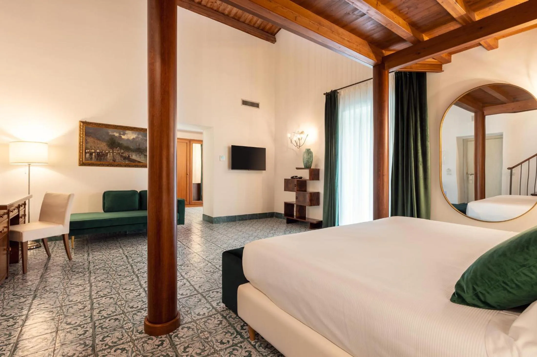 Bed in Dimora Caiammari Luxury Hotel & Spa