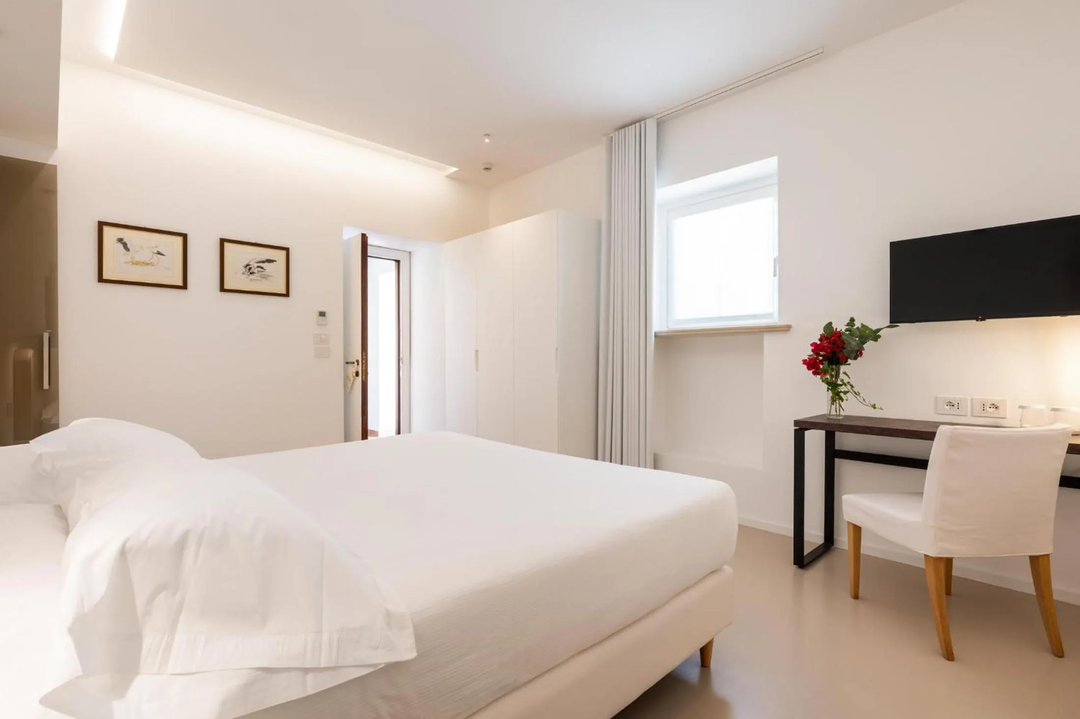 Bed in Dimora Caiammari Luxury Hotel & Spa