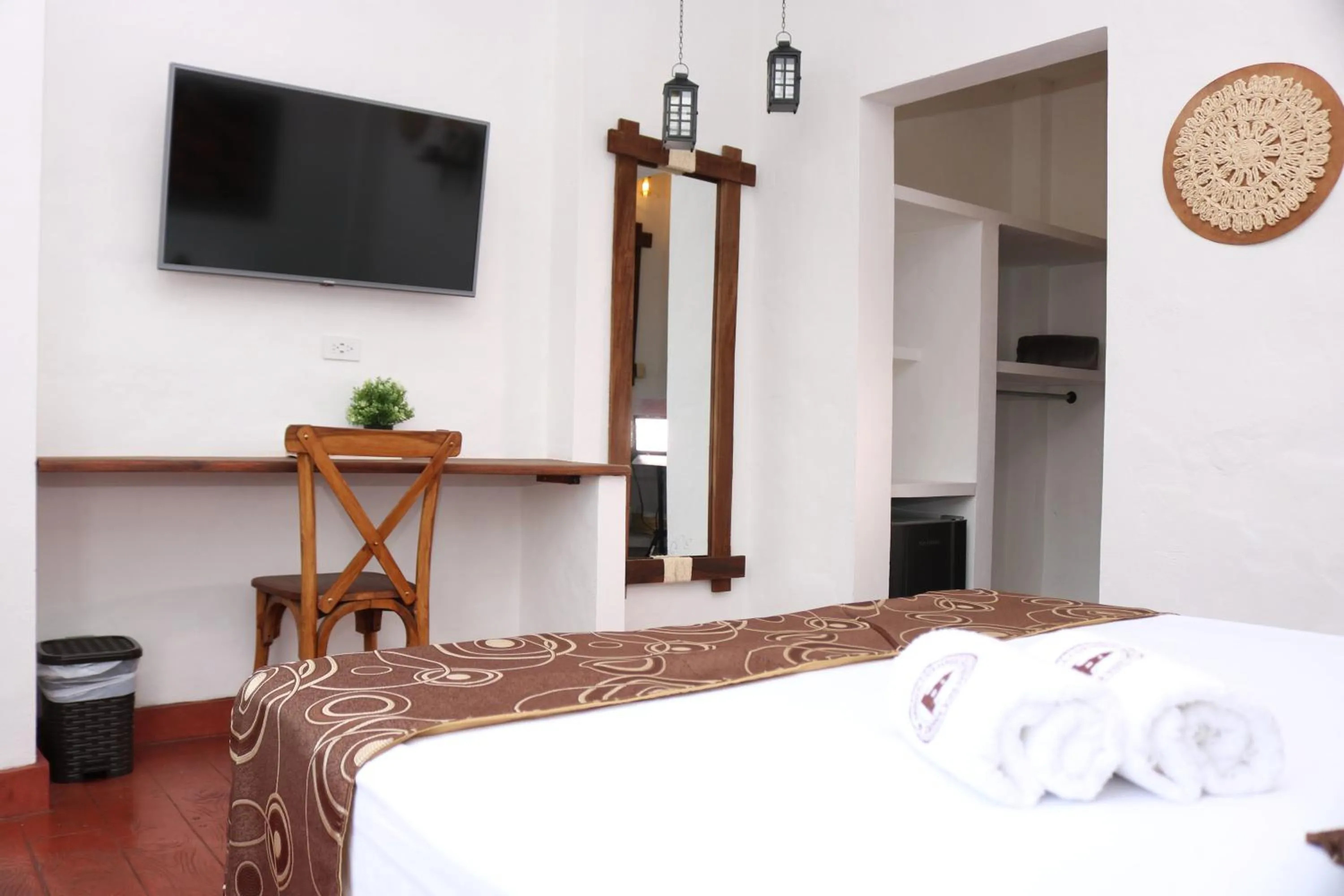 Photo of the whole room, Bed in Honda Colonial Magdalena Resort