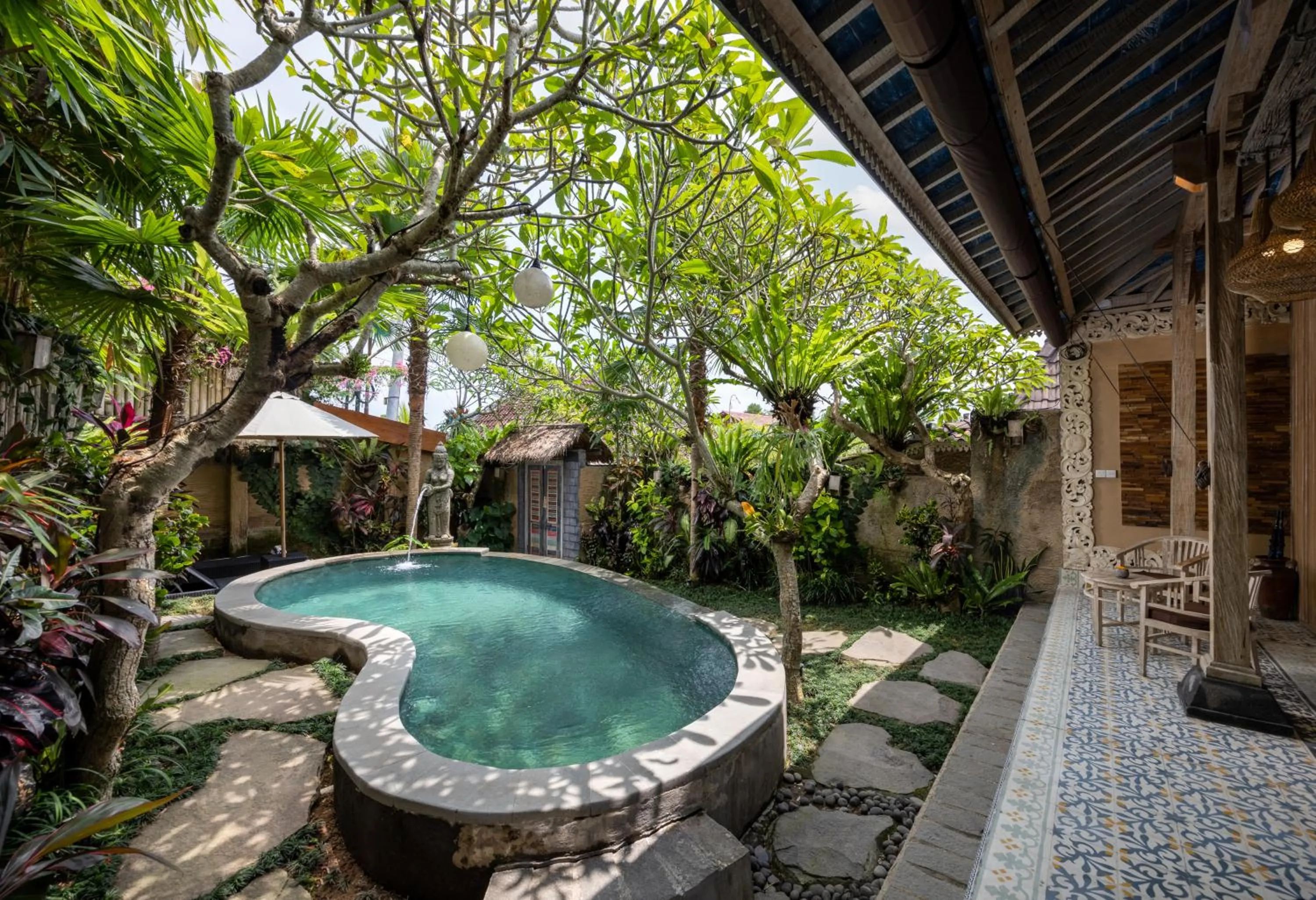 Swimming pool in Wooden Ganeca Villas by GenuineHost