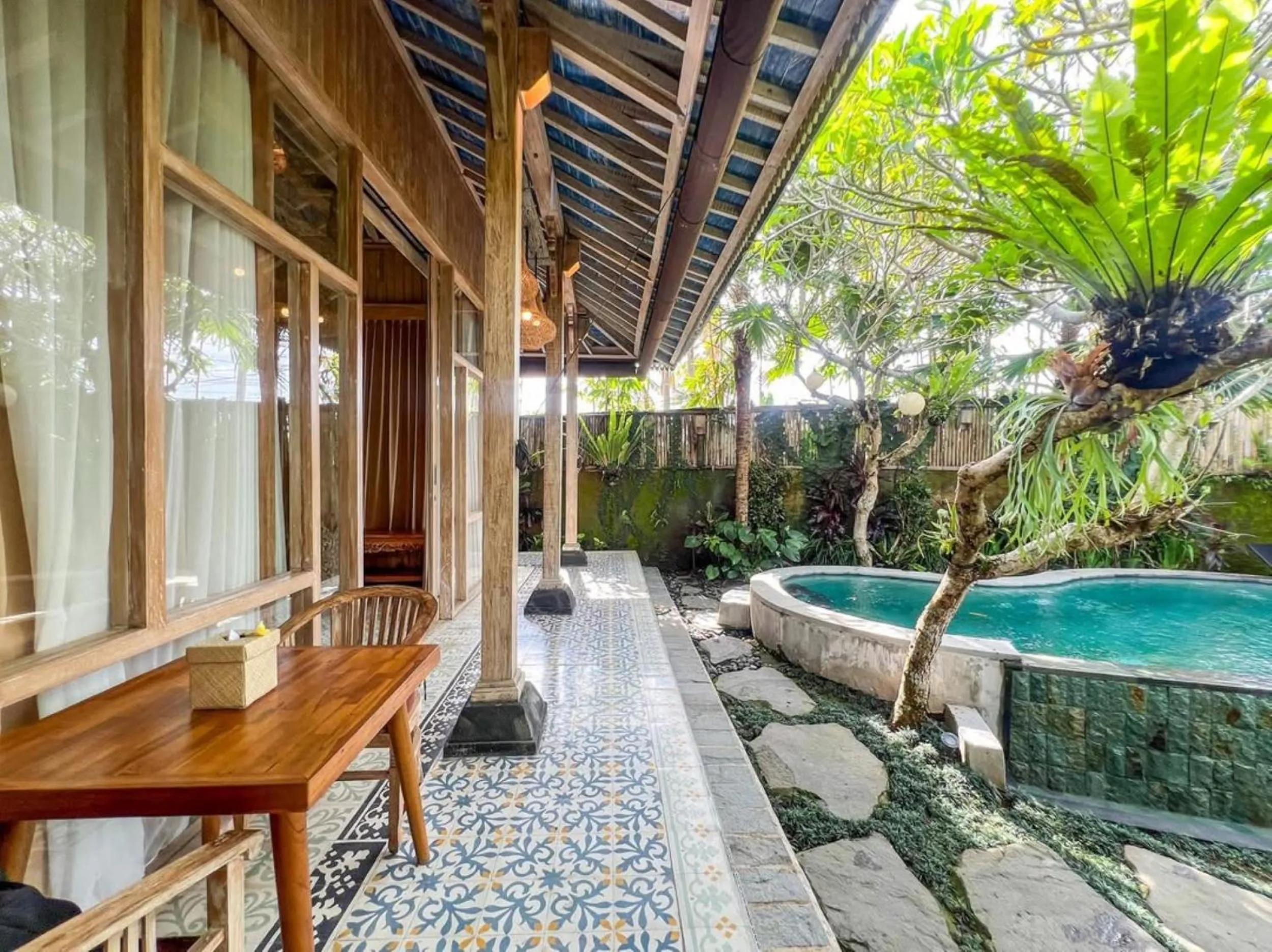 Swimming pool in Wooden Ganeca Villas by GenuineHost