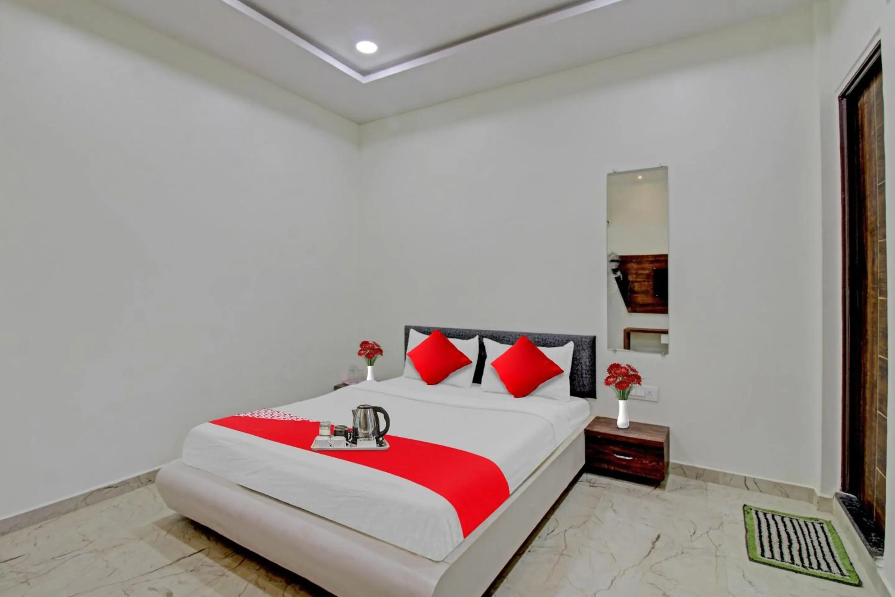 Bedroom, Bed in Hotel O Dhurva Inn