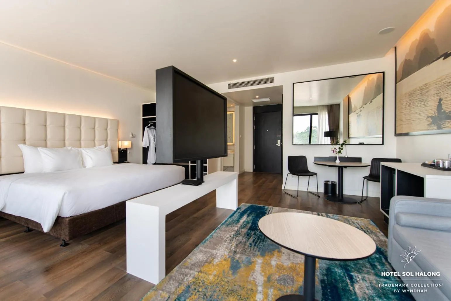 Seating area, Bed in Hotel Soleil Ha Long, Trademark Collection by Wyndham