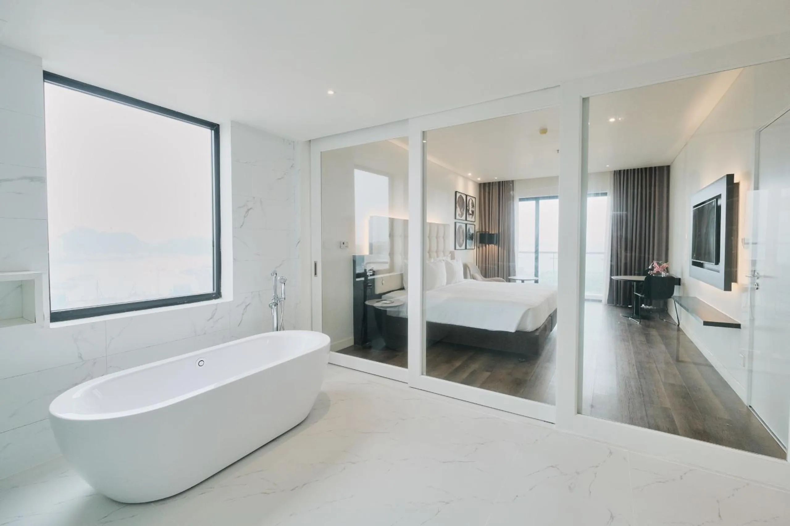 Toilet, Bed in Hotel Soleil Ha Long, Trademark Collection by Wyndham