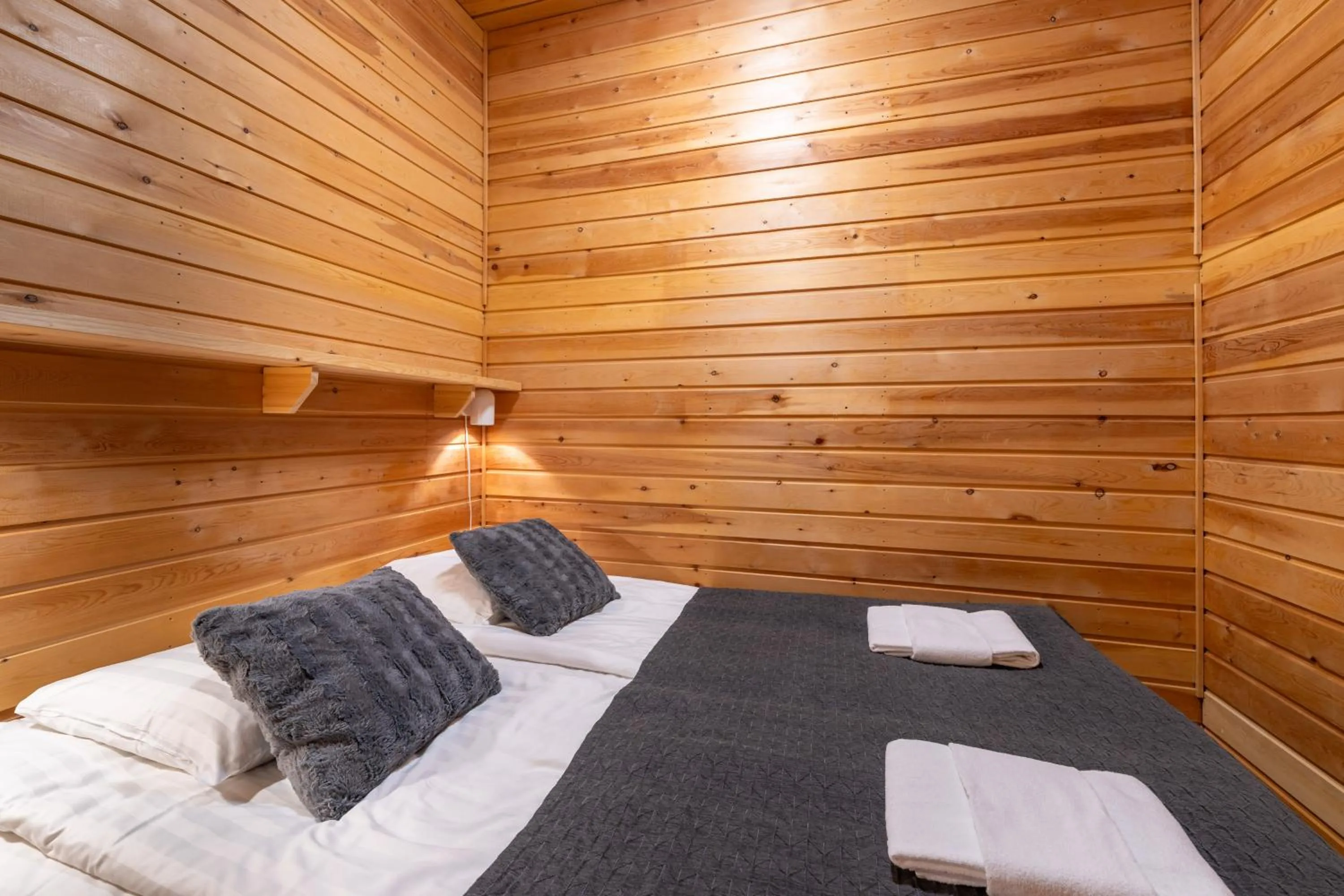 Bed in Kuukkeli Apartments Tokka