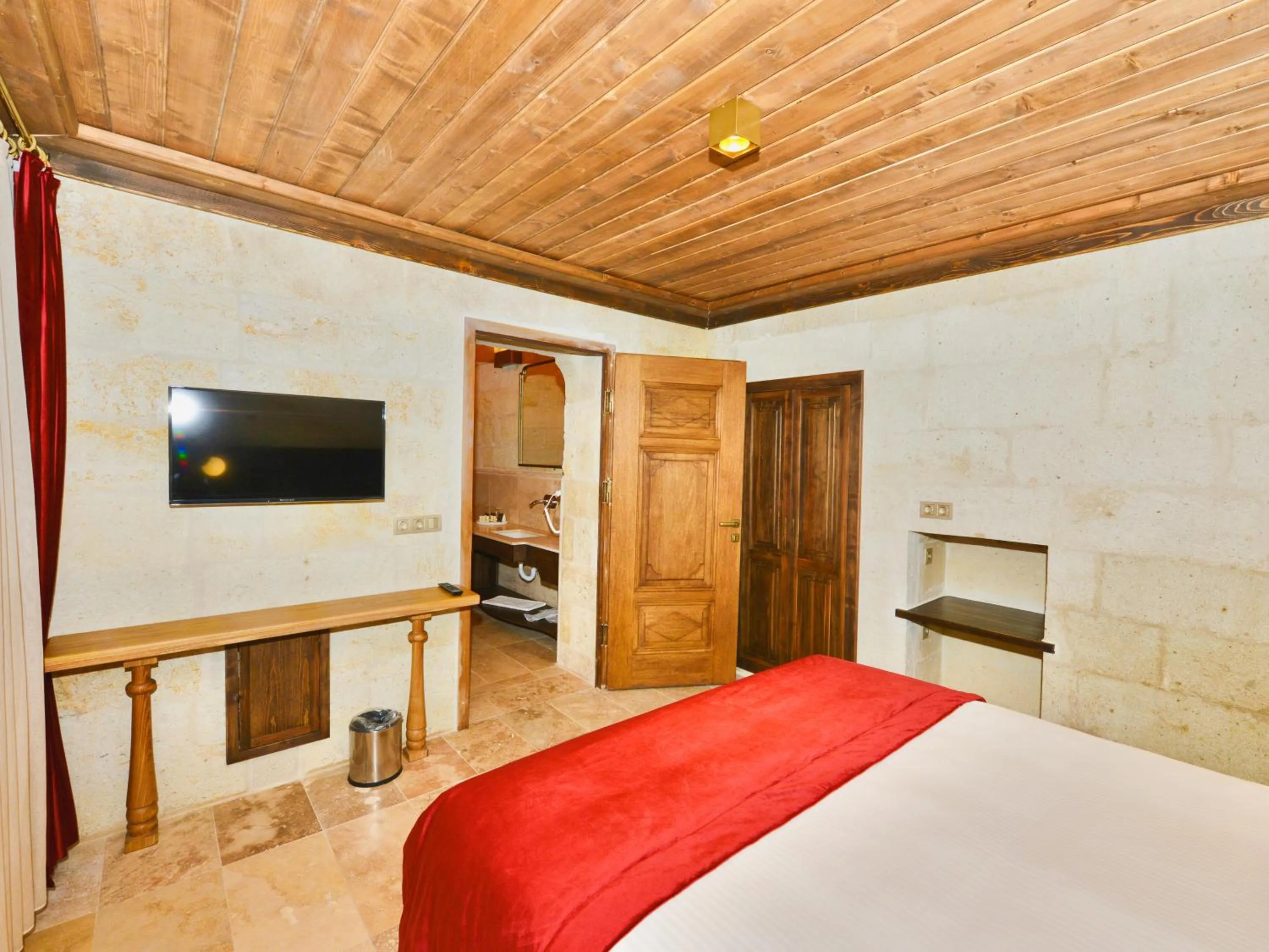 TV and multimedia, Bed in Evanthia Cave Suites - Special Class