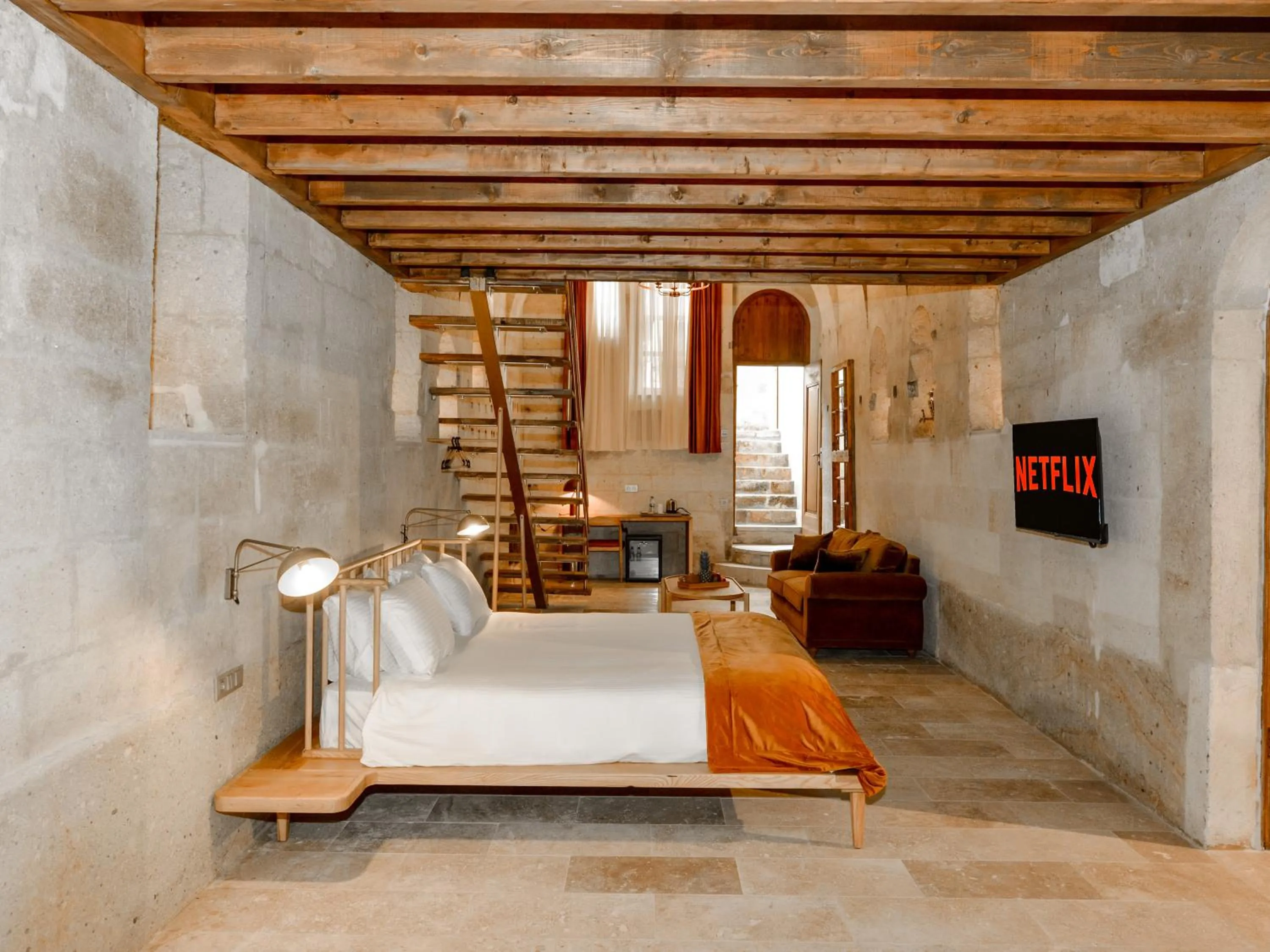 Bed in Evanthia Cave Suites - Special Class